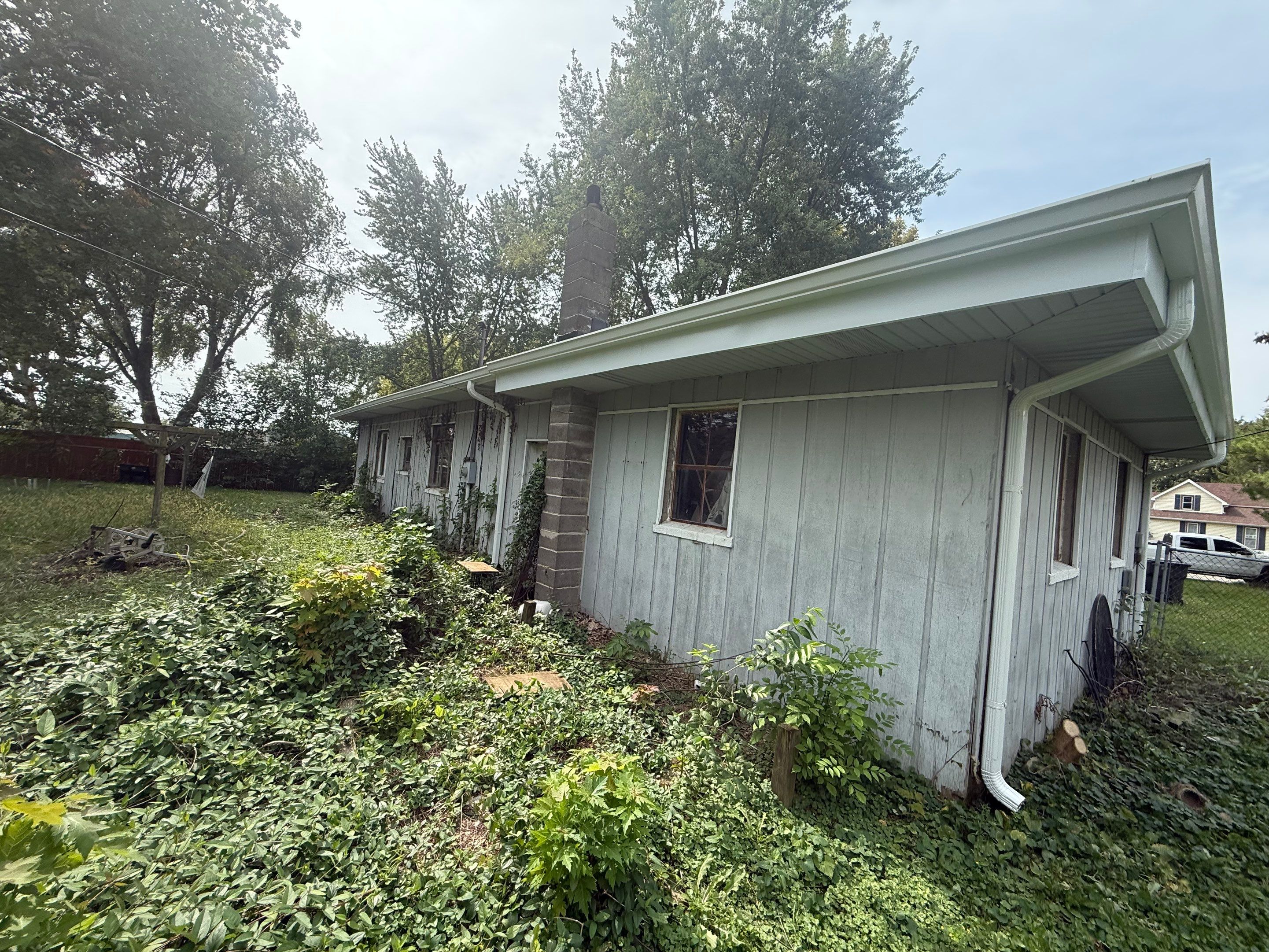 Owens Corning Duration - Chateau Green / 6-Inch Gutters - White by Hoel Roofing & Remodeling