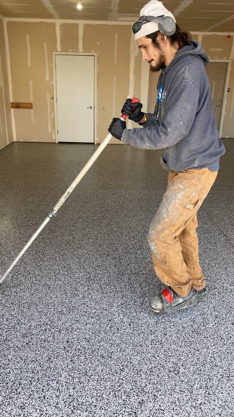 Garage using Domino  by Select Painting, Coatings & Garage Cabinets