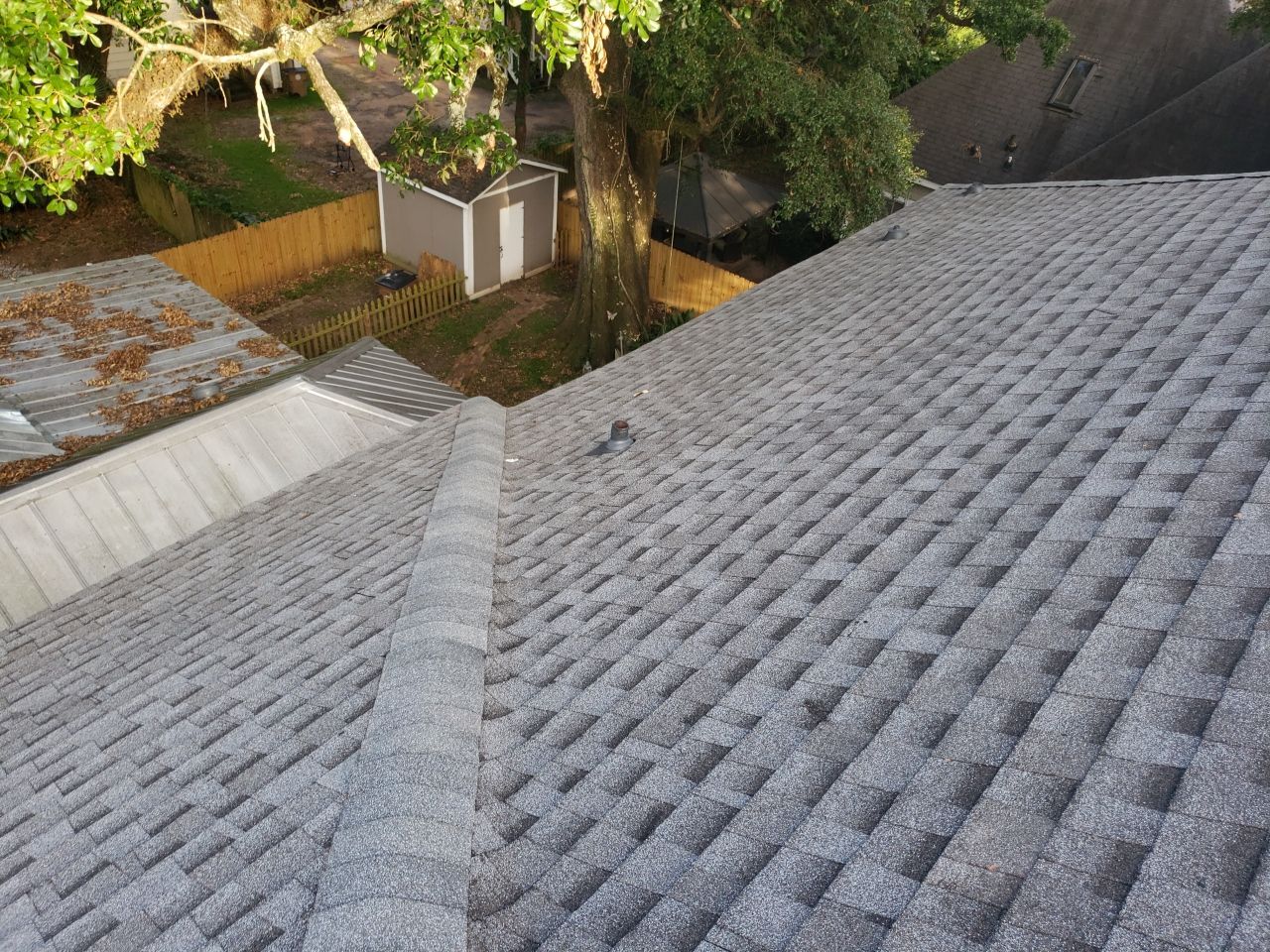 Residential Roofing Installation by American Roofing & Construction LLC