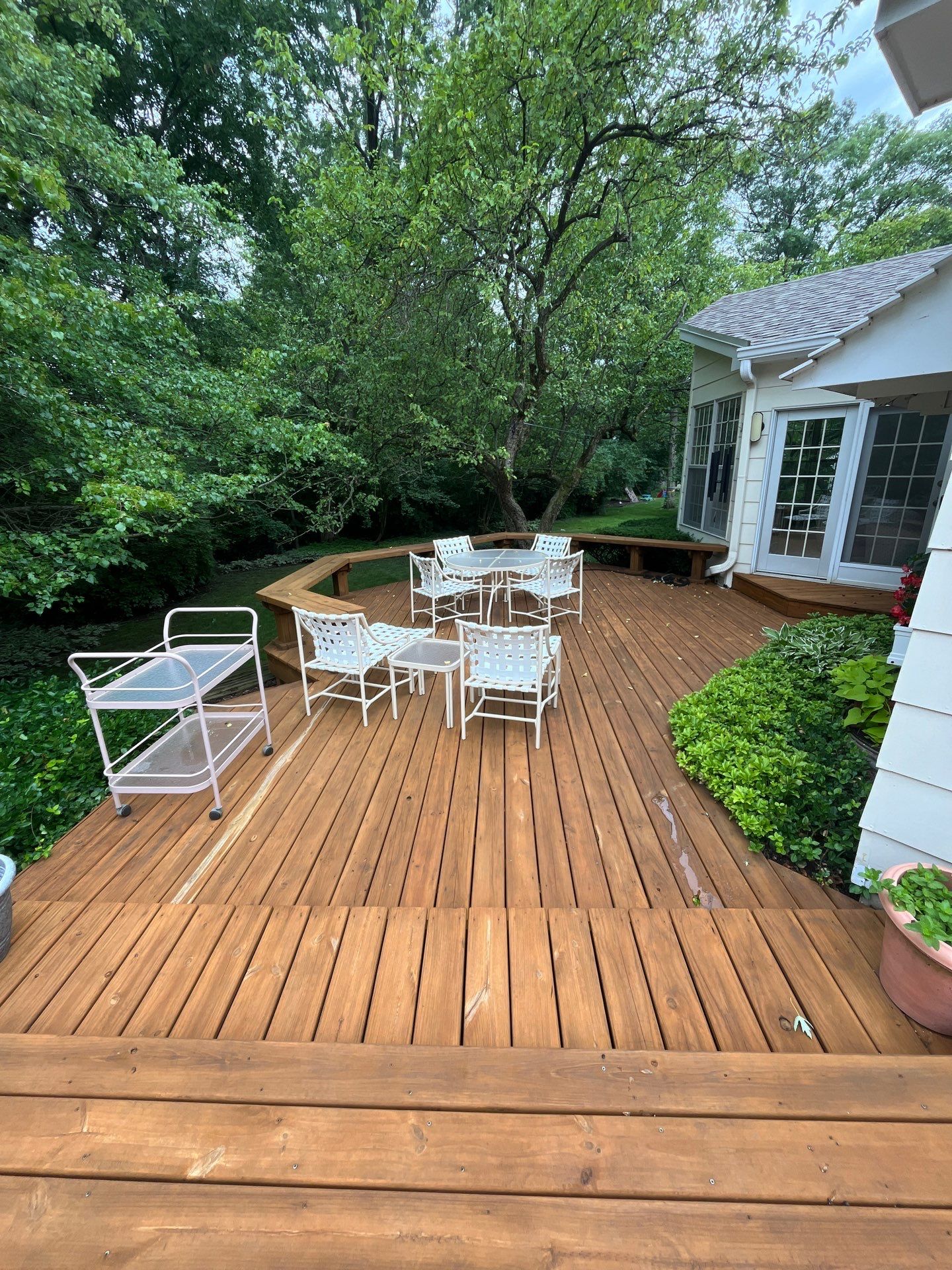 Wood cleaning and staining using Algaecide, soft wash soap by Northern Power Washing LLC.