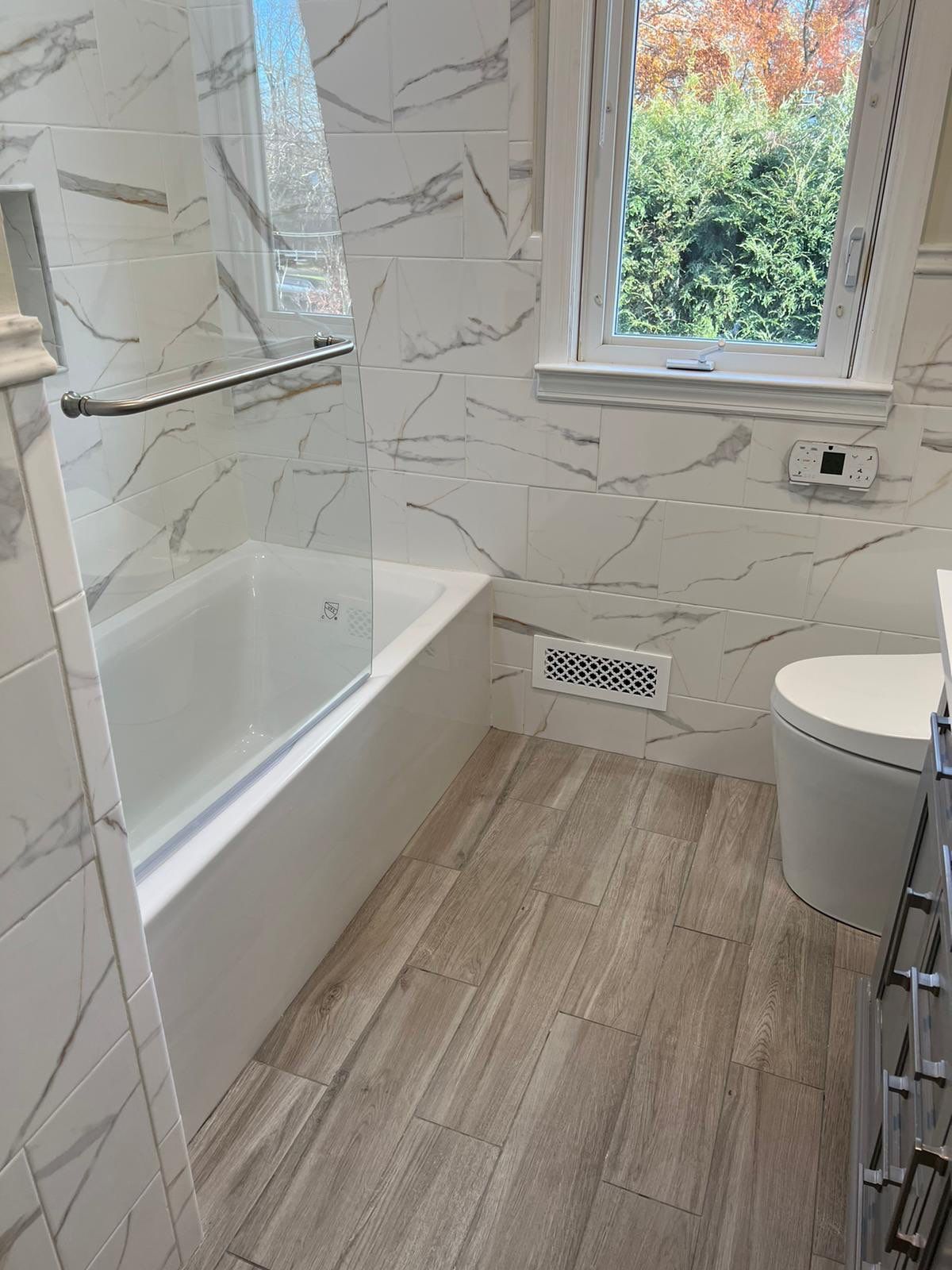 Bathroom Remodel using Tile by Home Concepts Construction