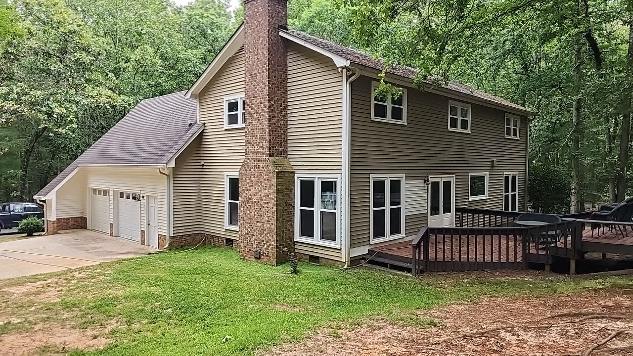 House Wash using cleaner by Power Wash Masters LLC