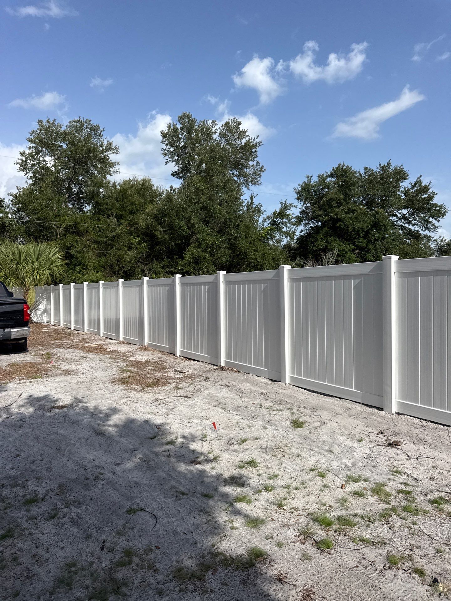 White Vinyl Privacy Fence Installation and Gate Assembly in Punta Gorda by True Fence LLC