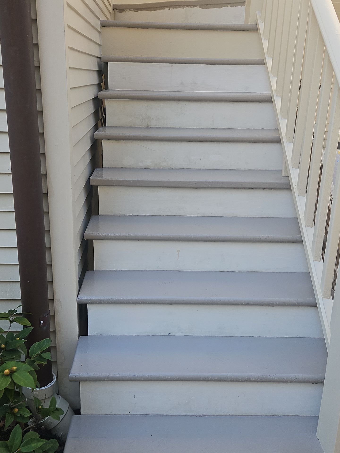 Painting of stairwell by King Cole Construction