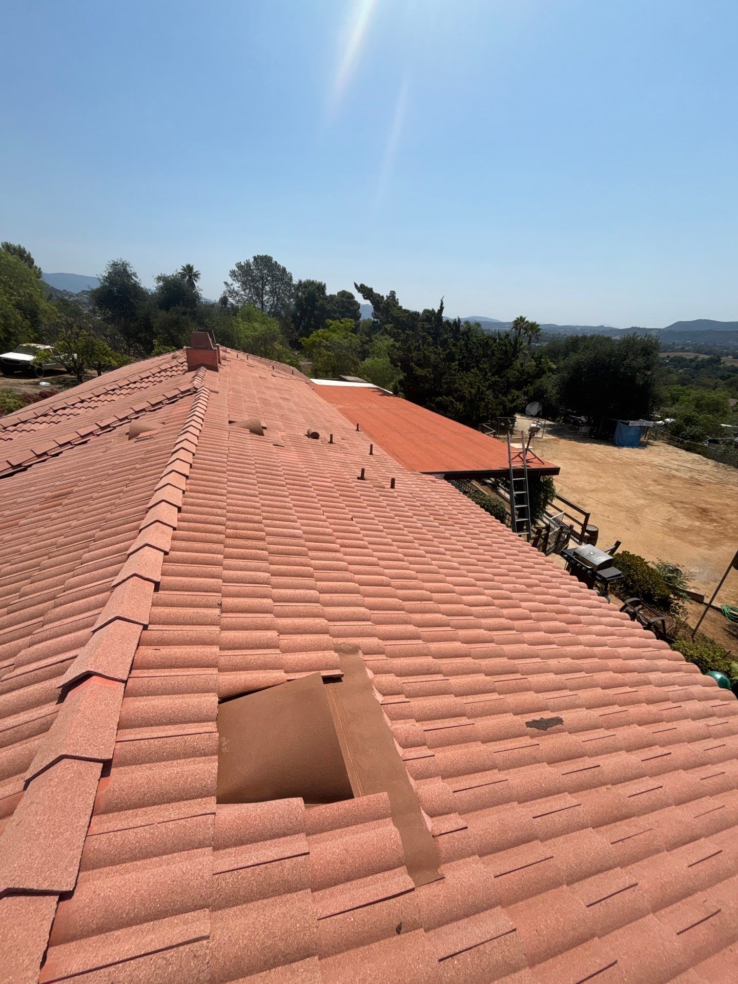 Valley Center Tile Roof Lift & Lay | Custom Metal Bird Stop for Los Arcos Tile by Zenith Roofing Services