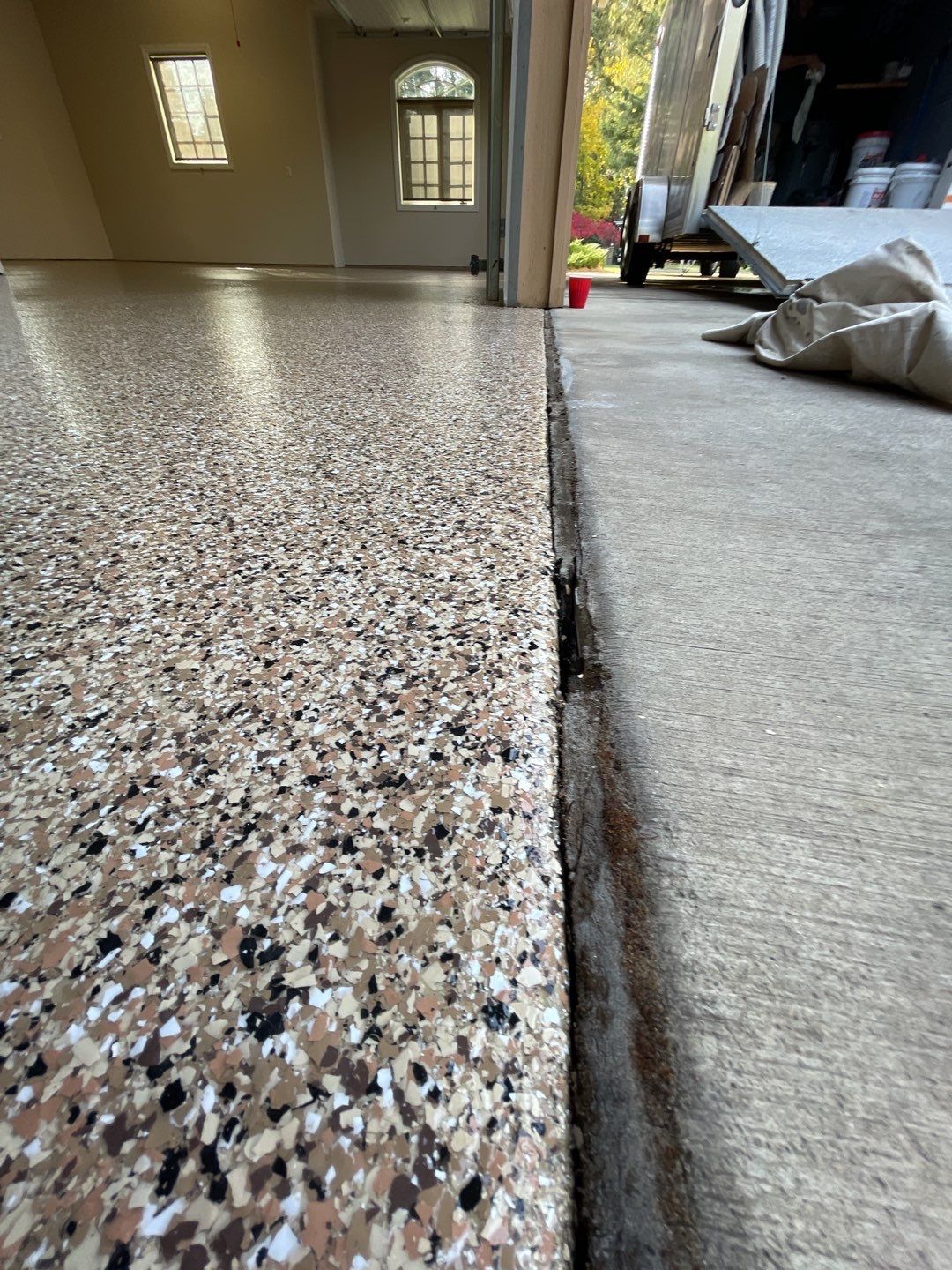 Garage Transformation using Sandstone by Croc Coatings, LLC