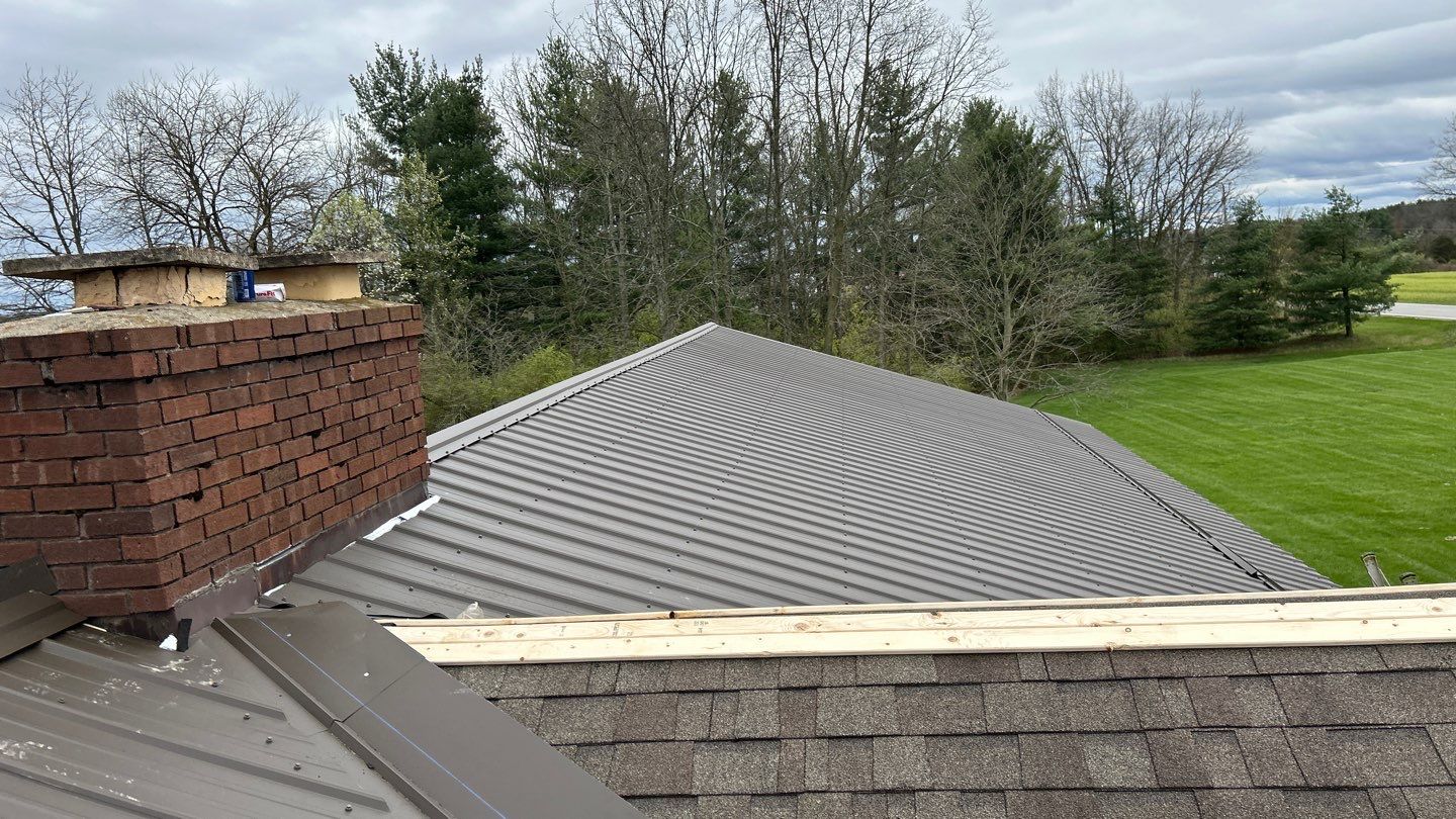 Residential Roofing Installation using Performance Panel Metal - Crinkle Bronze by RoofX 
