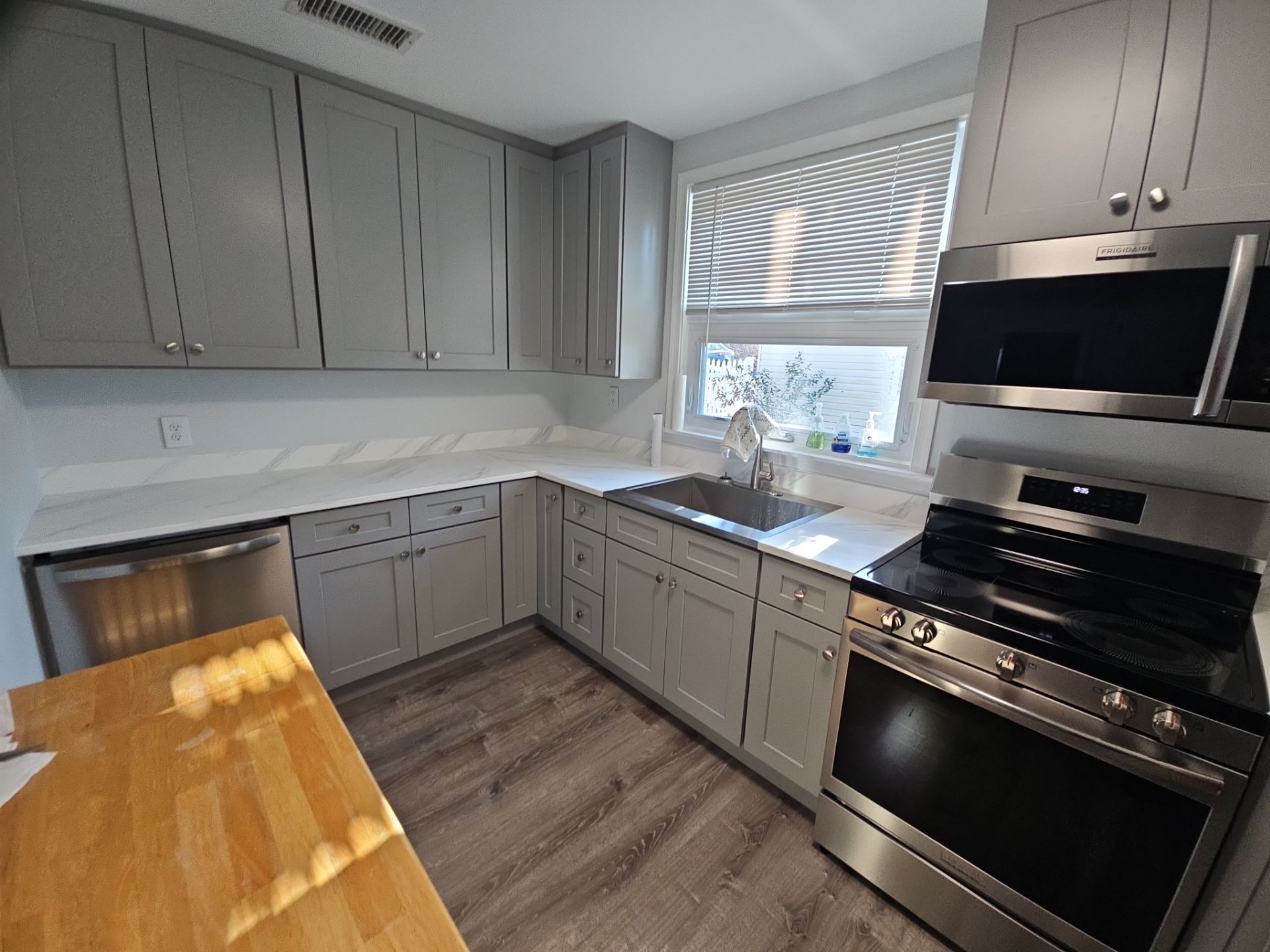 Kitchen and living area remodel by Window Depot of Annapolis