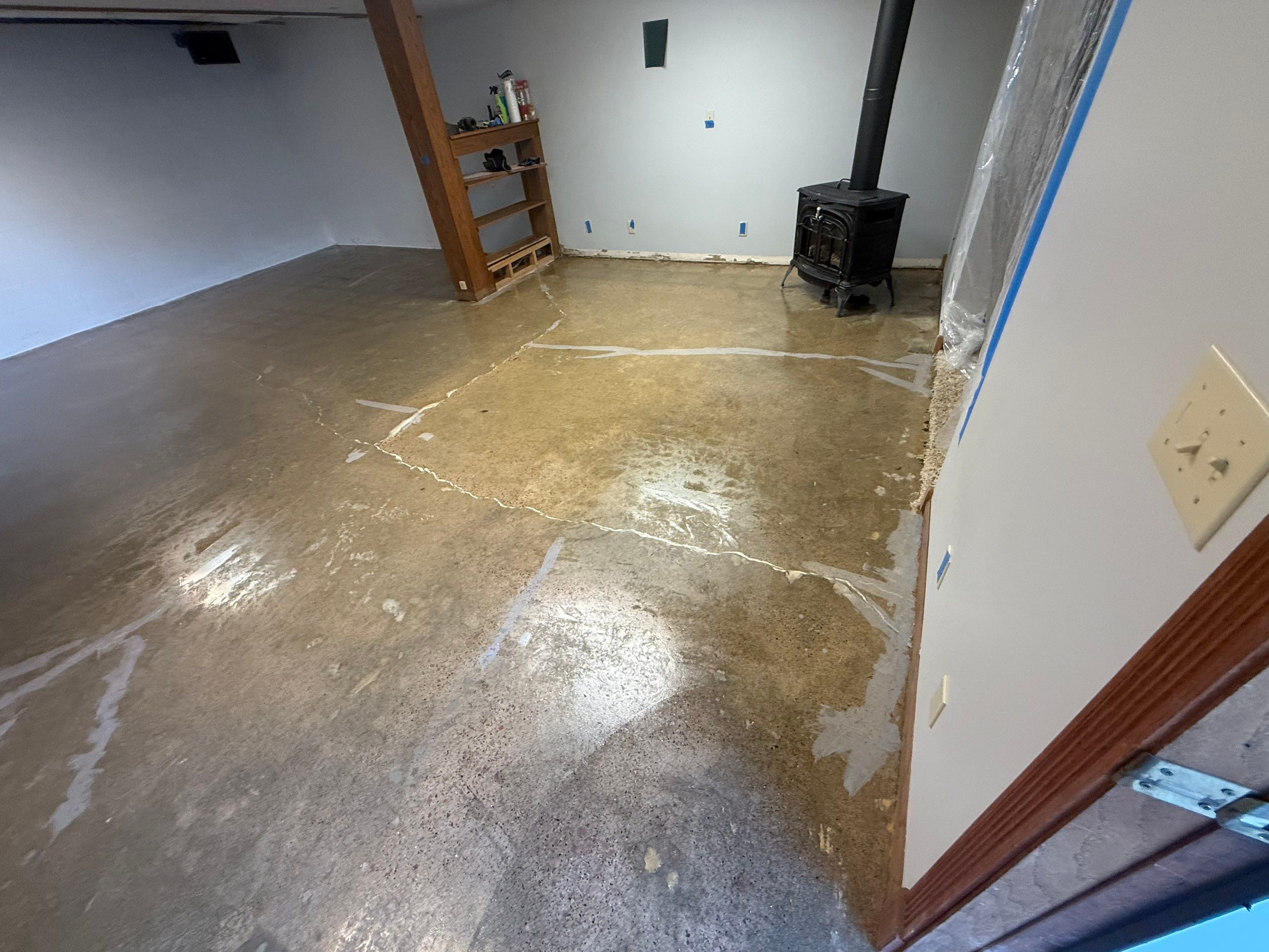 Solid Color Concrete Floor Coating for Renner Basement by Select Painting, Coatings & Garage Cabinets