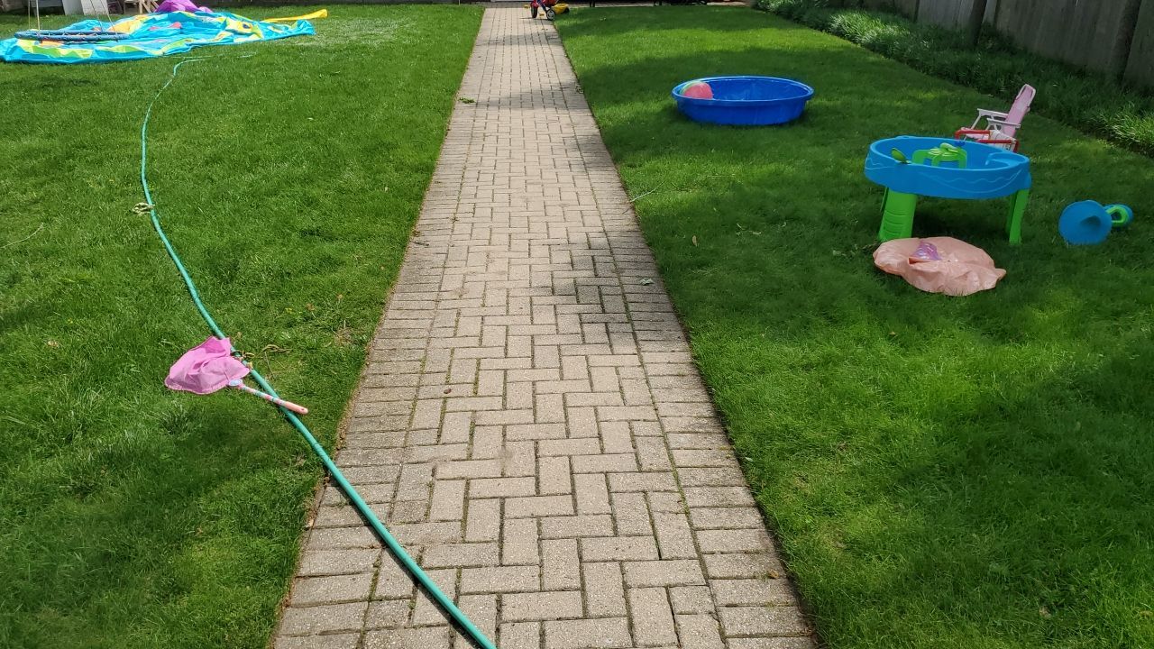 Brick patio repair, clean sand and seal by Northern Power Washing LLC.