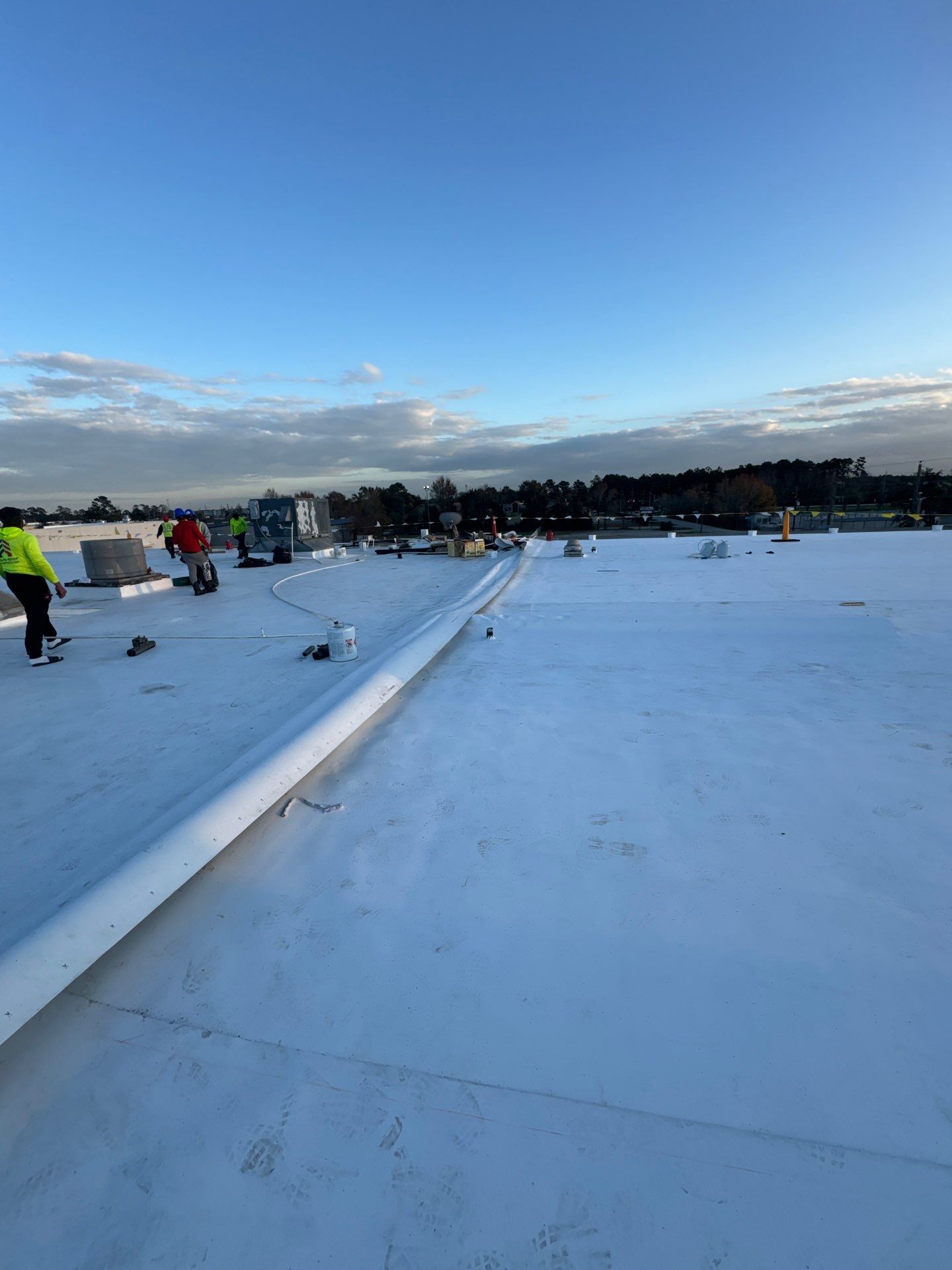 Commercial Roof Replacement using Carlisle Sureweld TPO at Ferguson Plumbing by Roof Experts