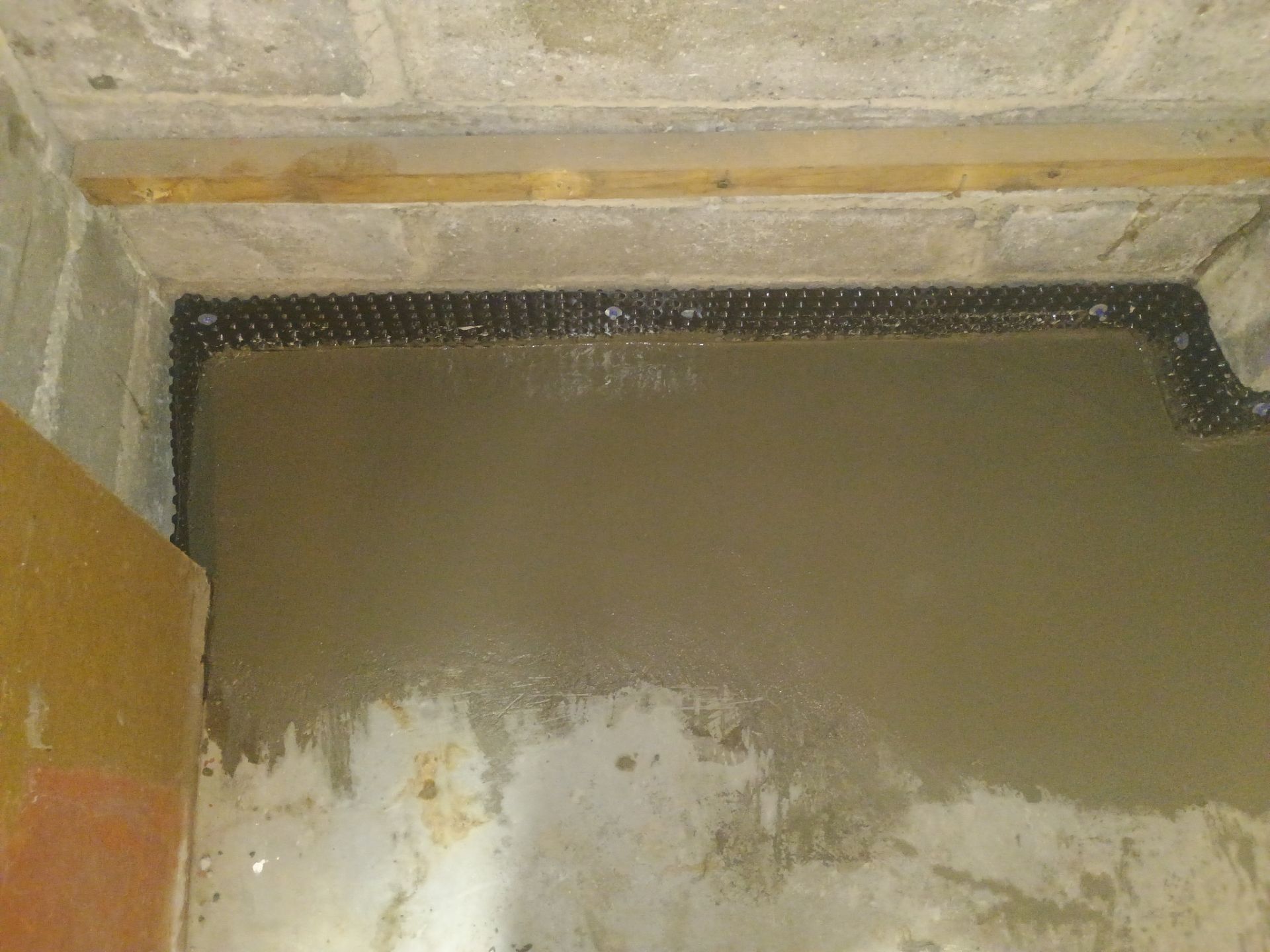 Interior Drain Tile for a South Minneapolis Basement by Waterproofing Northeast
