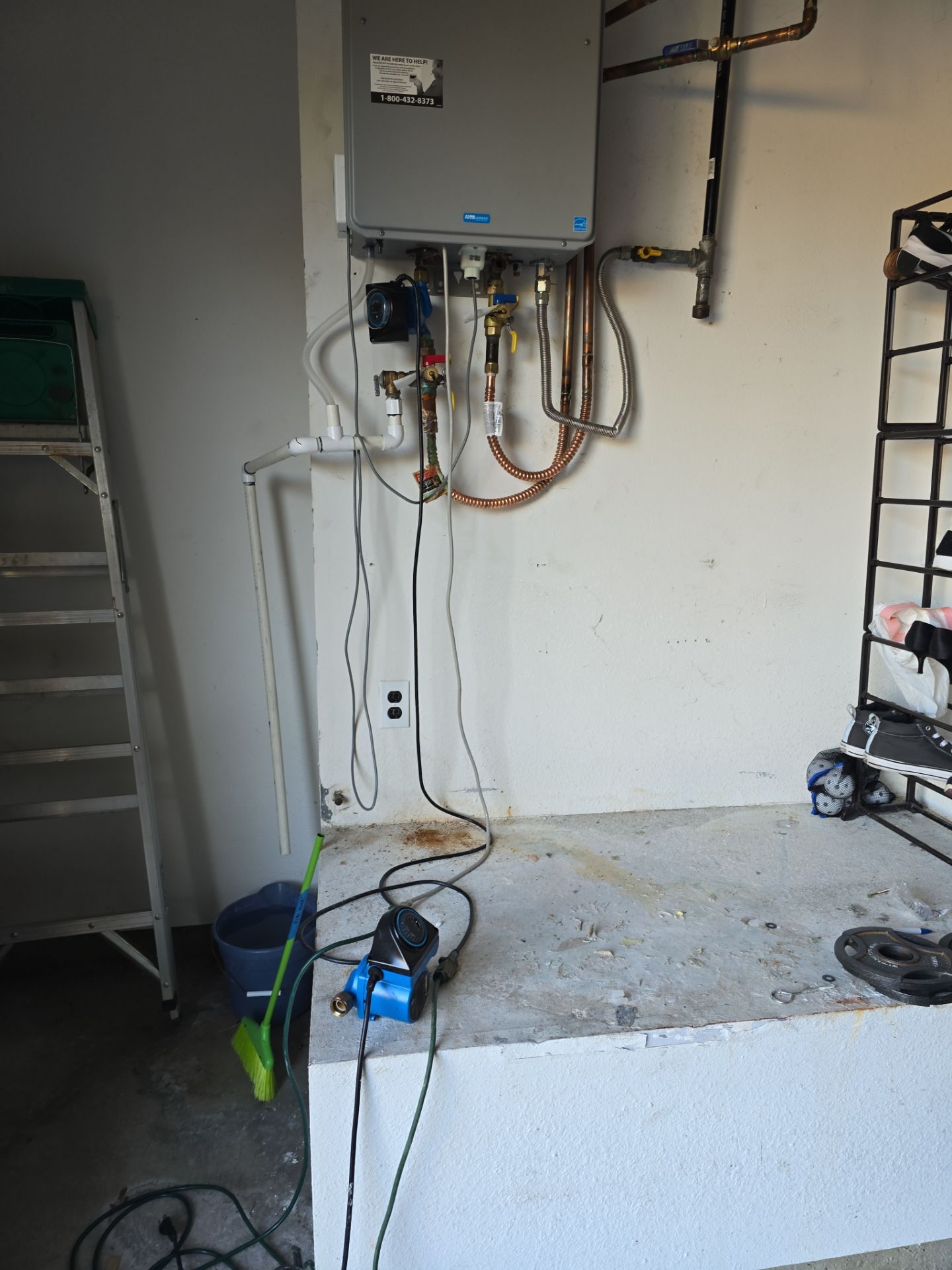 Installing a New Tankless Water Heater by Us Plumbing 