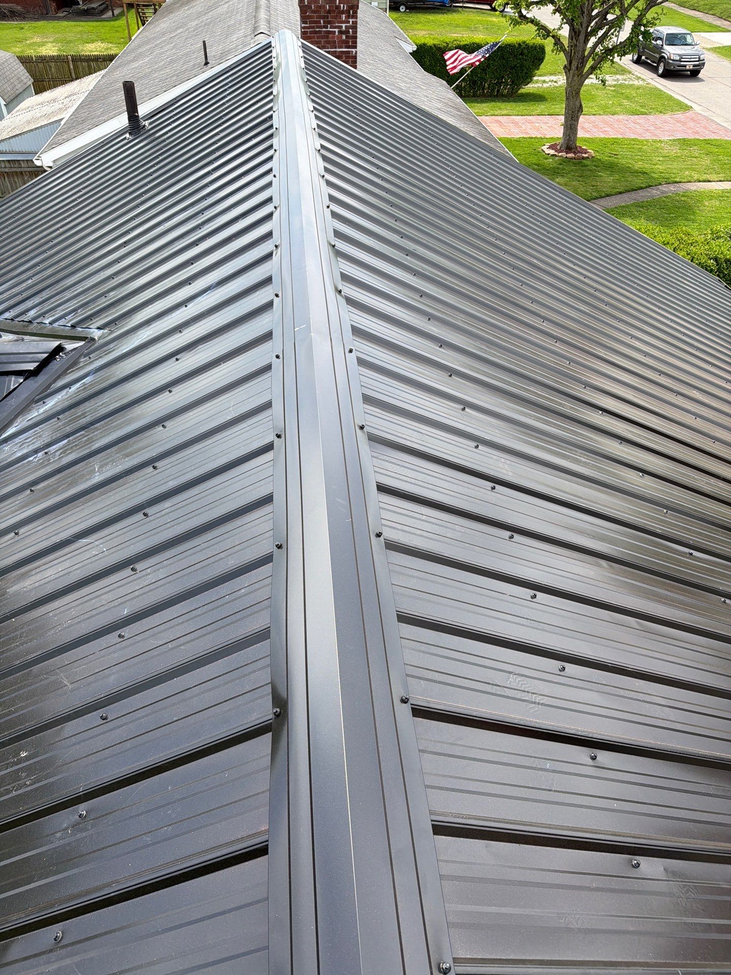 Residential Roofing Installation using Metal by Rainstoppers Roofing