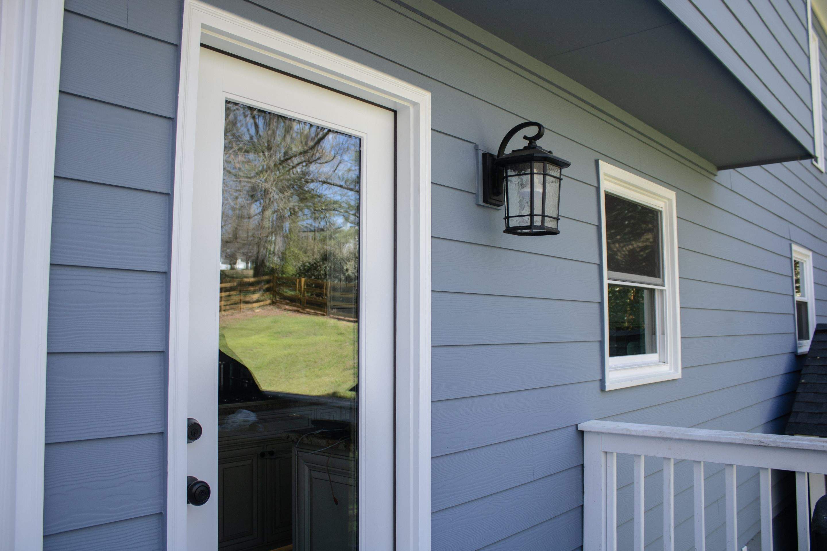 Marietta, GA Full Siding Replacement, 30+ Window Replacements, Screened-In Porch to Sunroom Conversion, Gutter Replacement, and Exterior Painting by Nelson Exteriors