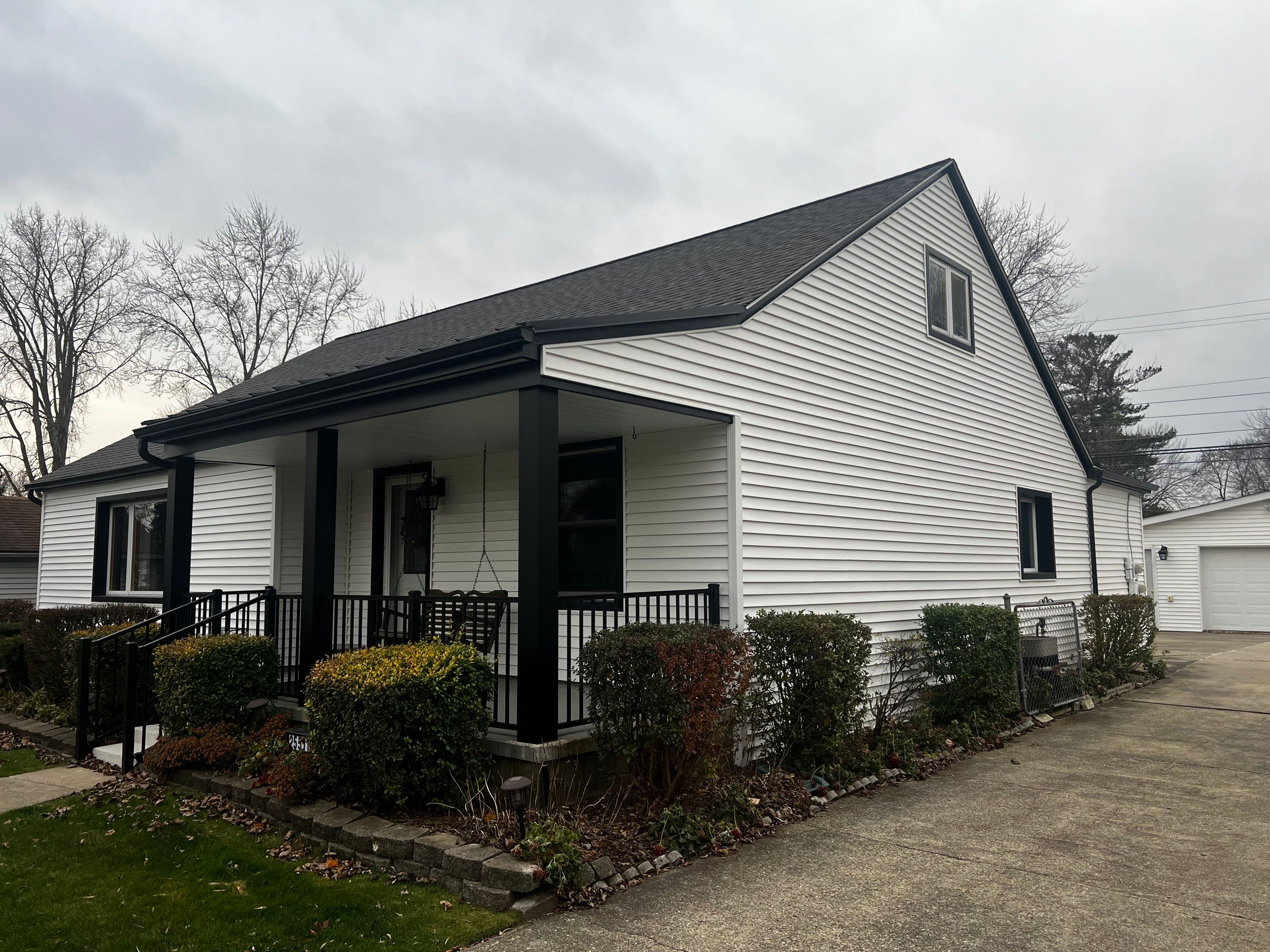 Siding Replacement using CertainTeed Monogram vinyl in Colonial White & Front Porch Remodel by Bloomfield Construction & Restoration