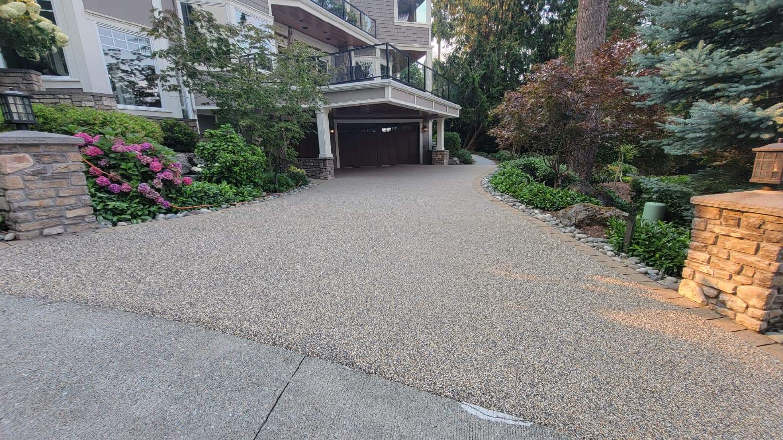 Coastal Grandeur Driveway and Patio in Big Sur Vuba Stone by Concrete Coating Experts Inc.