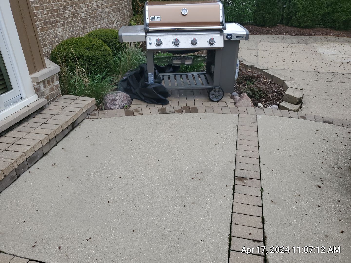 concrete patio and driveway cleaning by Northern Power Washing LLC.