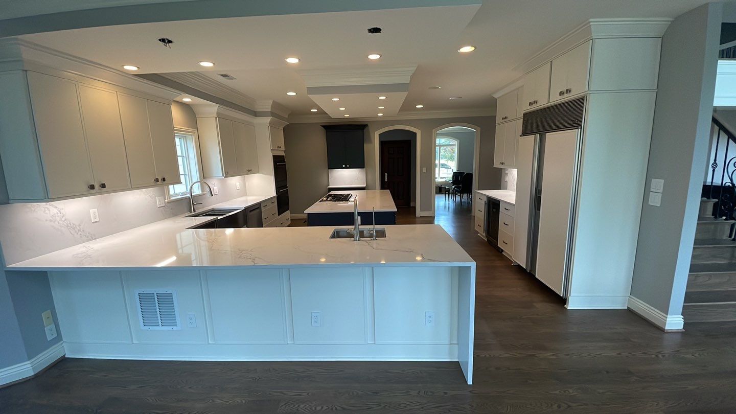 Kitchen Remodel using Fabuwood Luna Dove and Indigo Cabinetry by HomeWerkes Design & Build