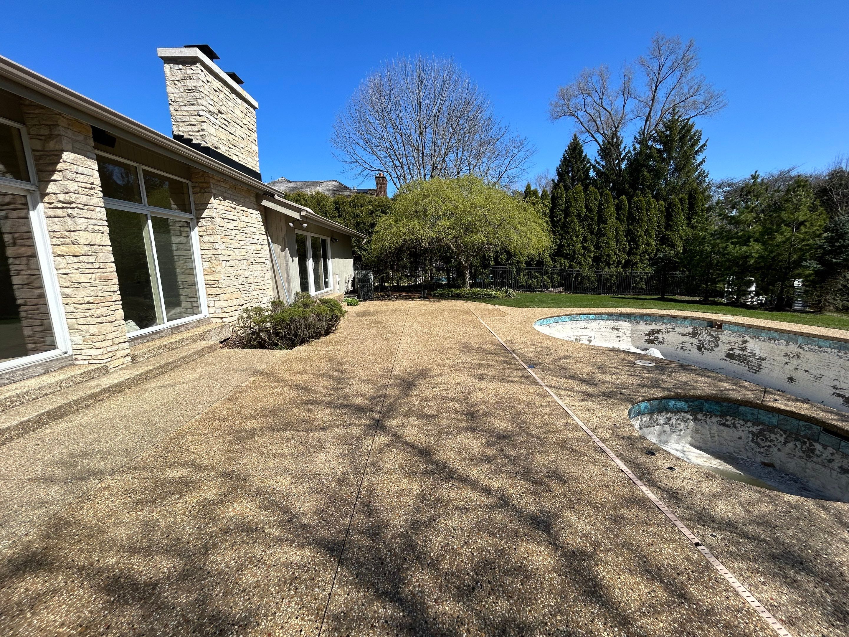 Aggregate Clean and seal using low gloss sealer by Northern Power Washing LLC.
