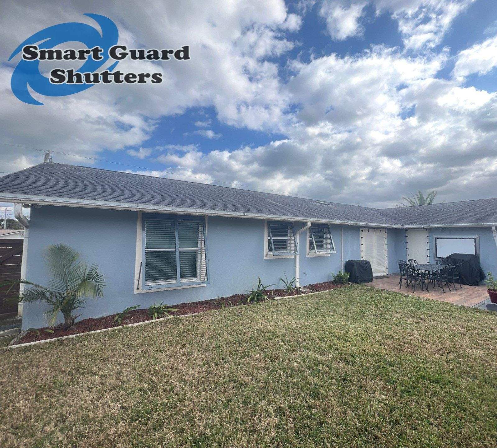 Hurricane Protection in Blue Grey by Smart Guard Shutters