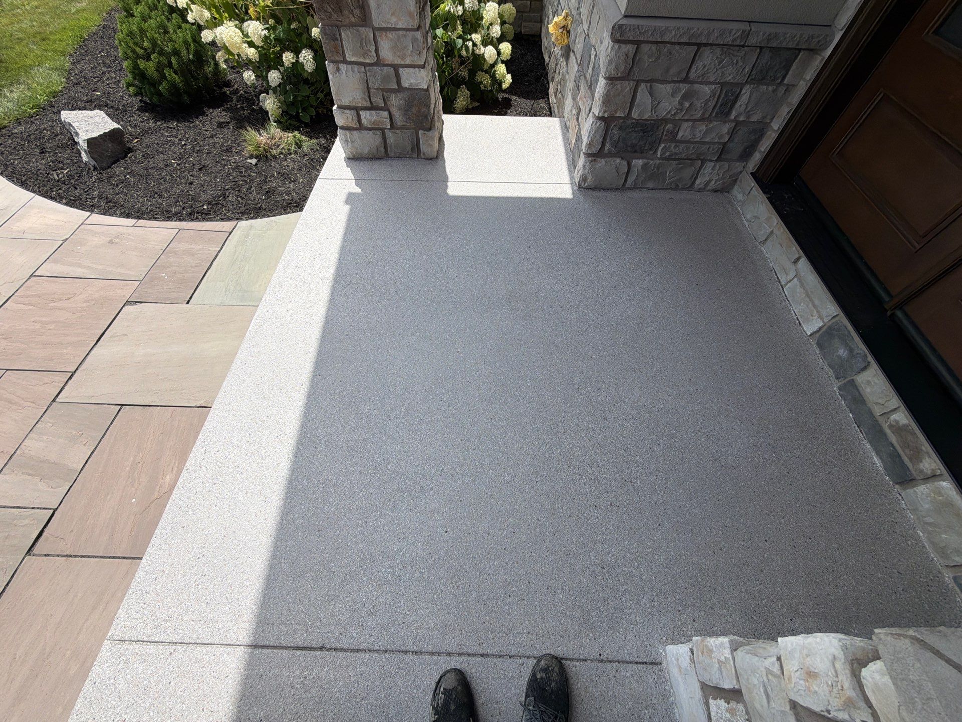 Callisto Porch Coating by NG Masonry & Construction LLC
