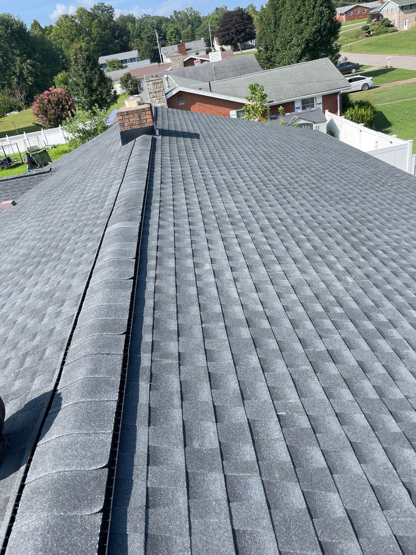 Residential Roofing Installation using GAF Timberline HDZ Charcoal by Rainstoppers Roofing