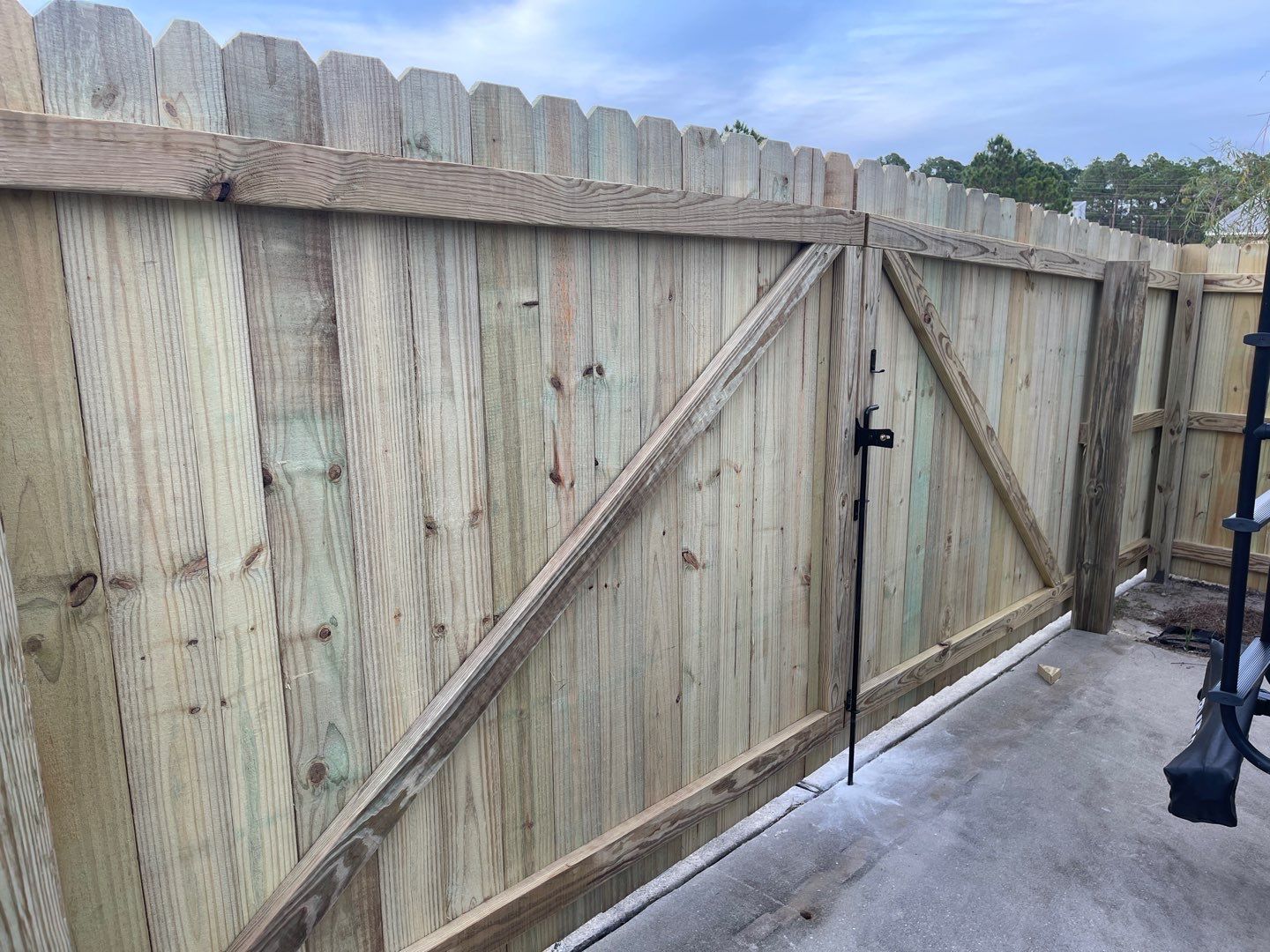 6' WOOD PRIVACY WITH 14' DOUBLE DRIVE GATE using PRESSURE TREATED PINE by Hip Square Fence Inc.