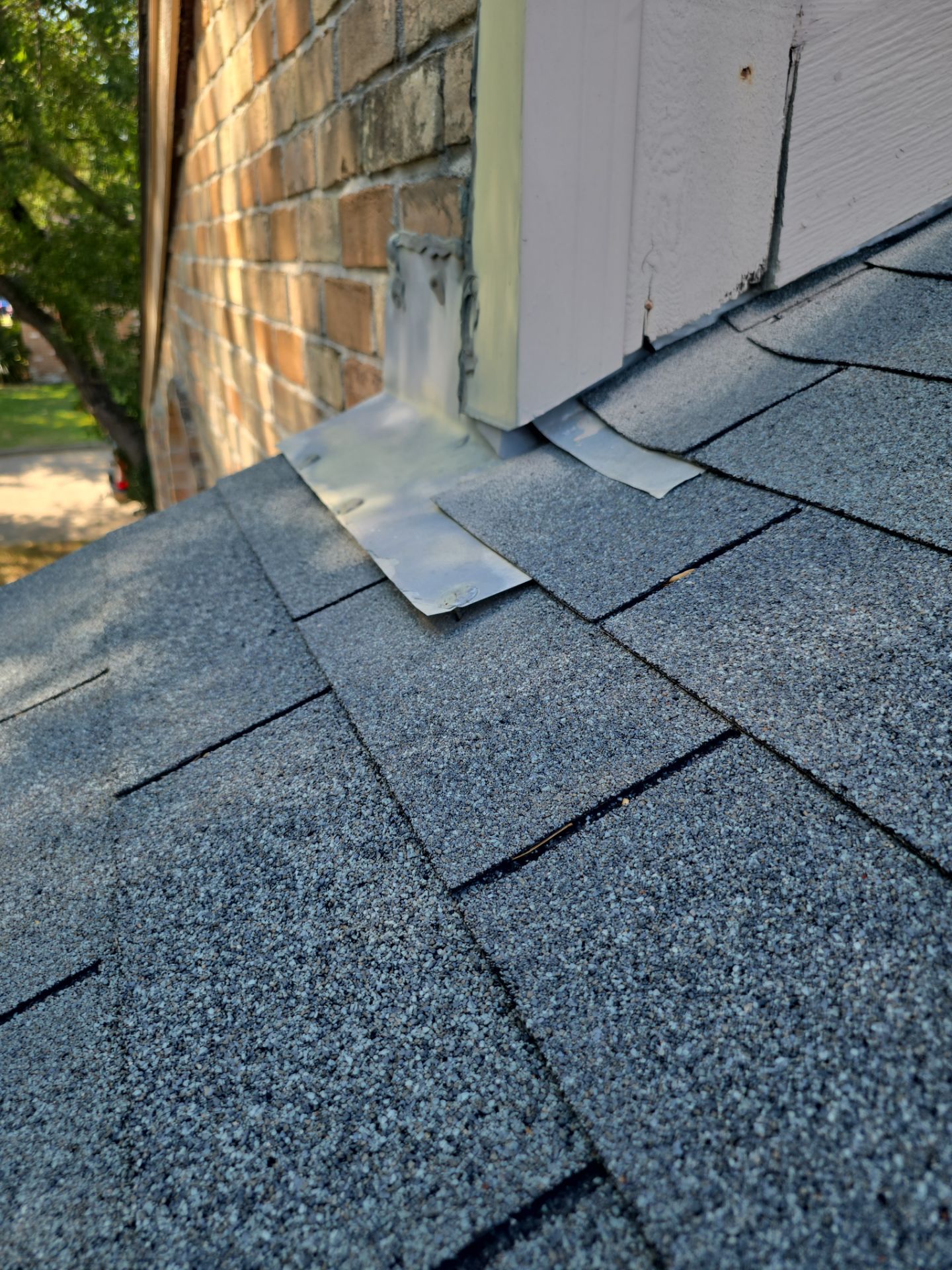 Asphalt Shingle Roof Repair and Skylight Sealing in Houston by One Legacy United