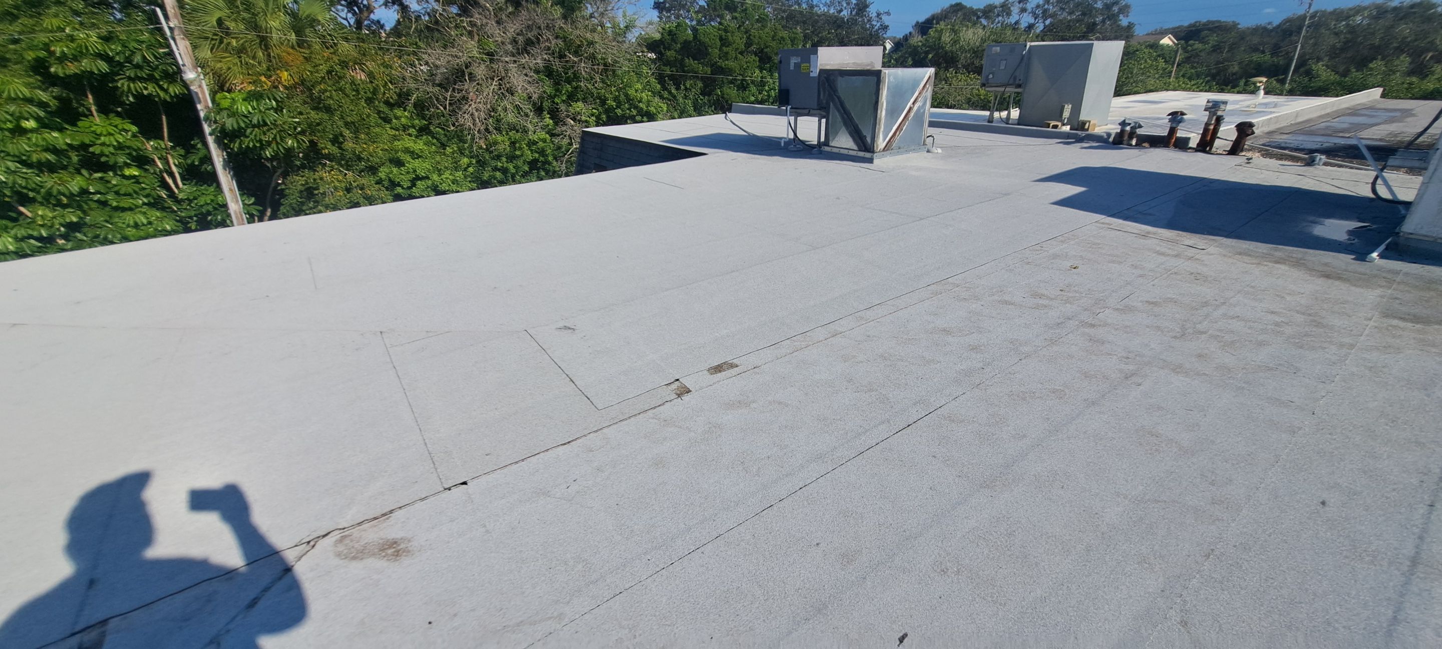 Flat Reroof Replacement New Smyrna Beach FL by Pinnacle Roofing Group