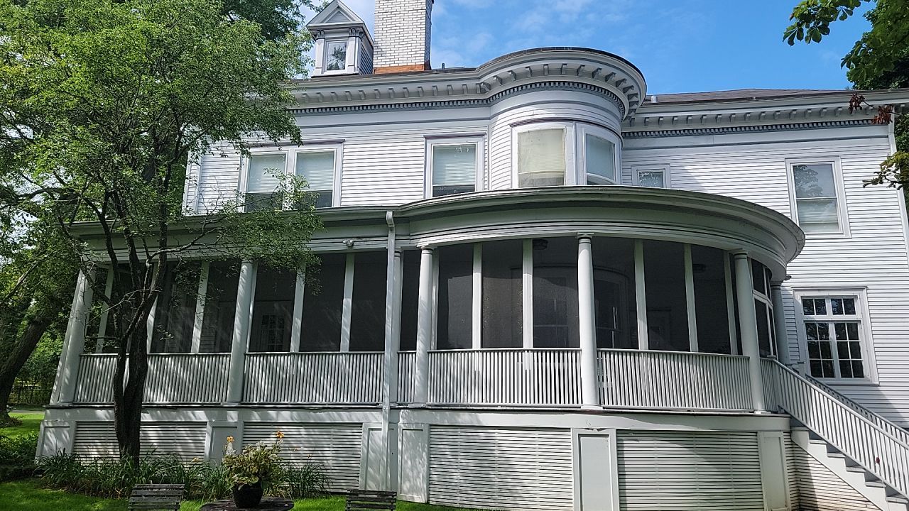 Housewashing  using Algaecide, soft wash soap by Northern Power Washing LLC.