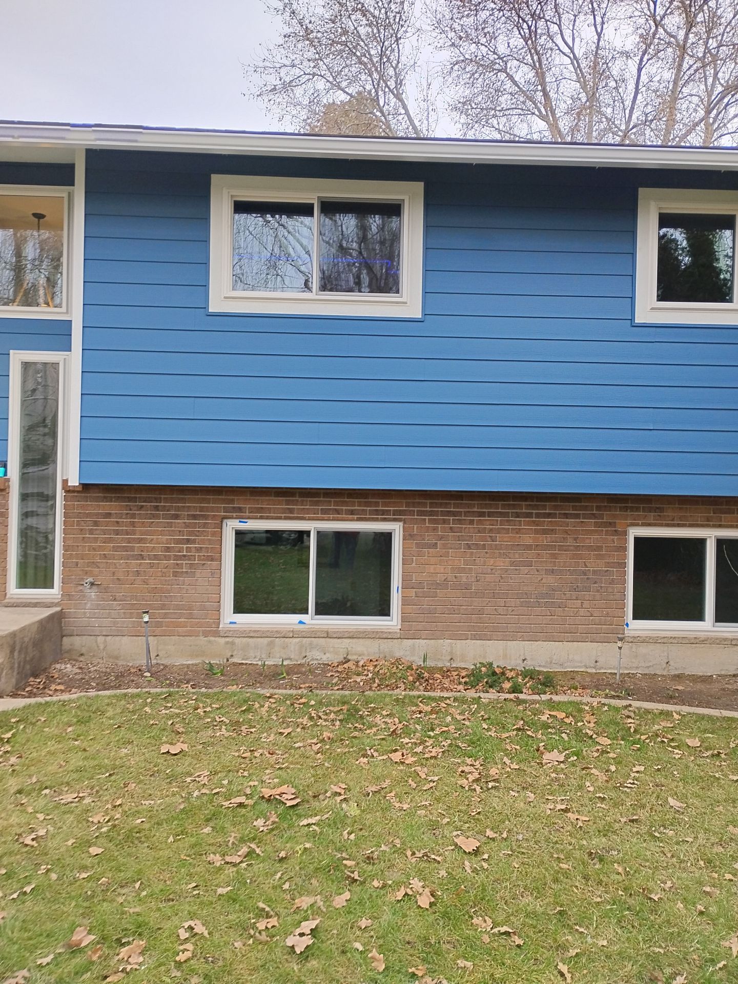 Siding, Windows, Doors, Gutters by BN Covered Exteriors