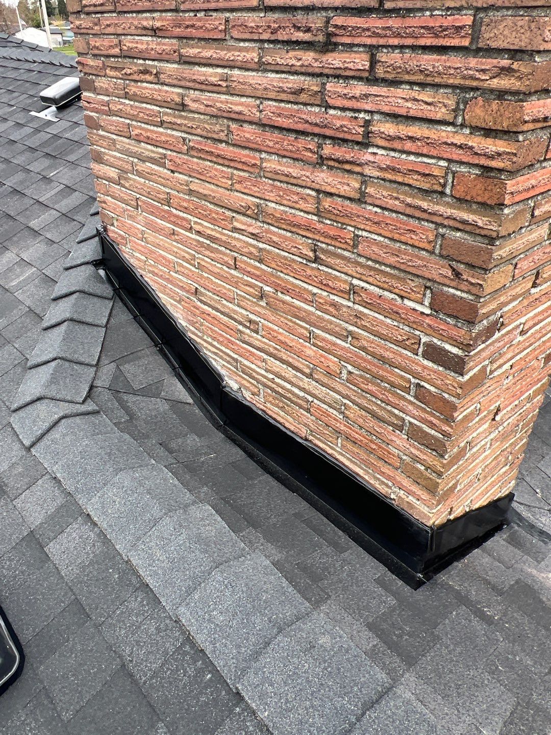 Residential Roofing Installation using IKO Dynasty (Color: Granite Black) by Orezona Building & Roofing Company, Inc.