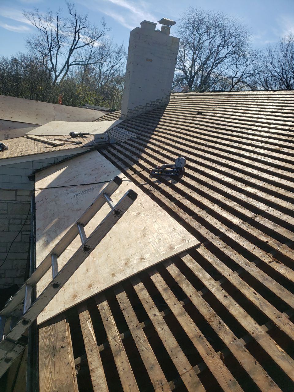 Asphalt Roof Replacement by Custom Installations