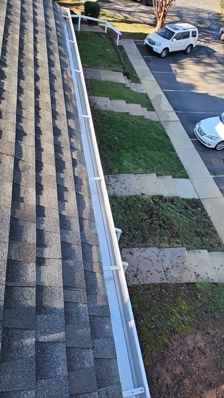 Gutter Cleaning using water by Power Wash Masters LLC