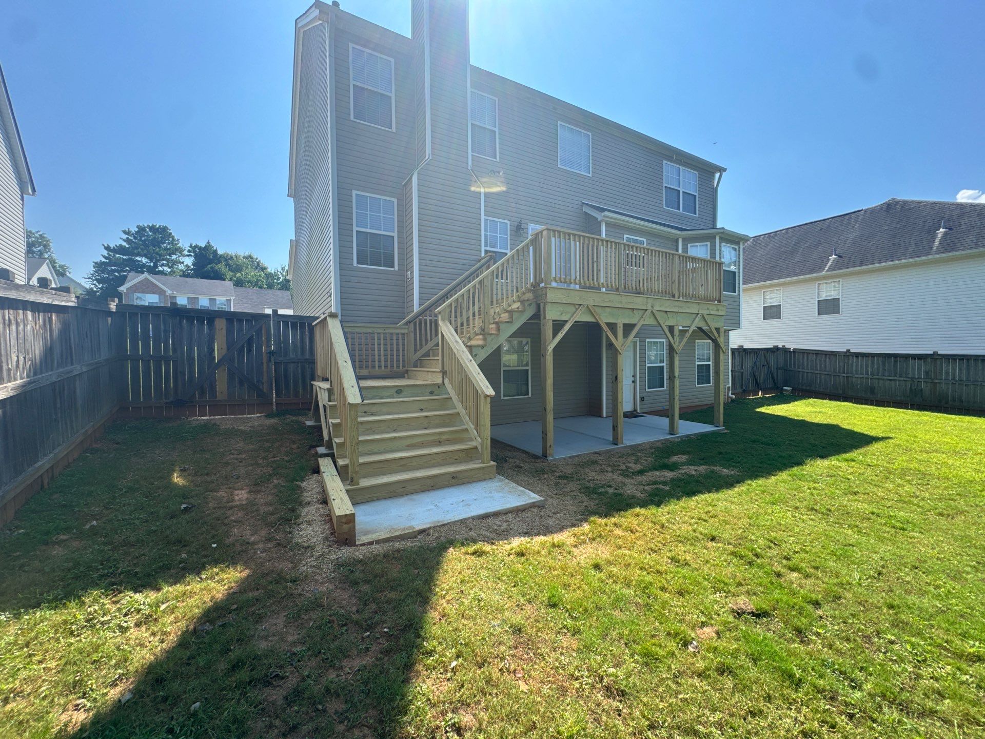 Backyard Deck Expansion & Custom Staircase Installation in Suwanee. by Swift Home Renovations