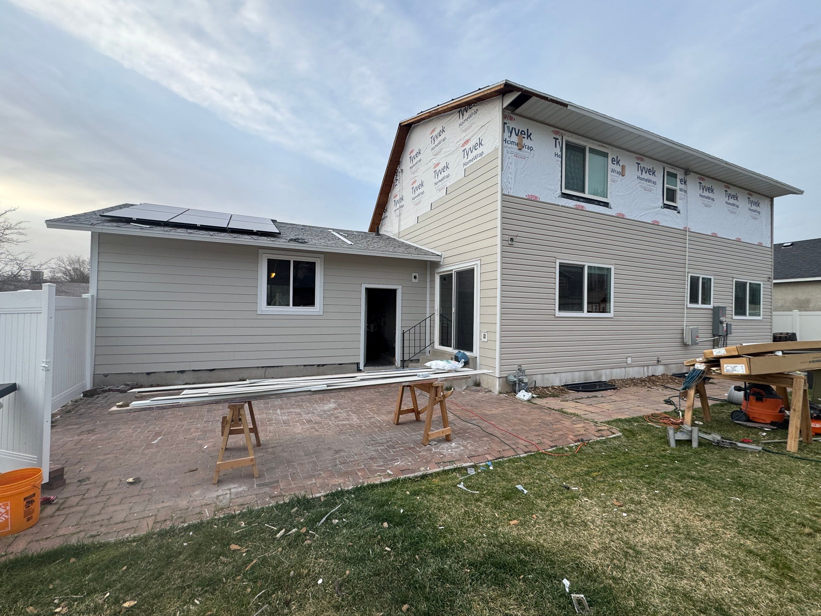 Sandy | Strategic Hardie & Vinyl Integration | Cobble Stone & Desert Sand by Ideal Siding Utah