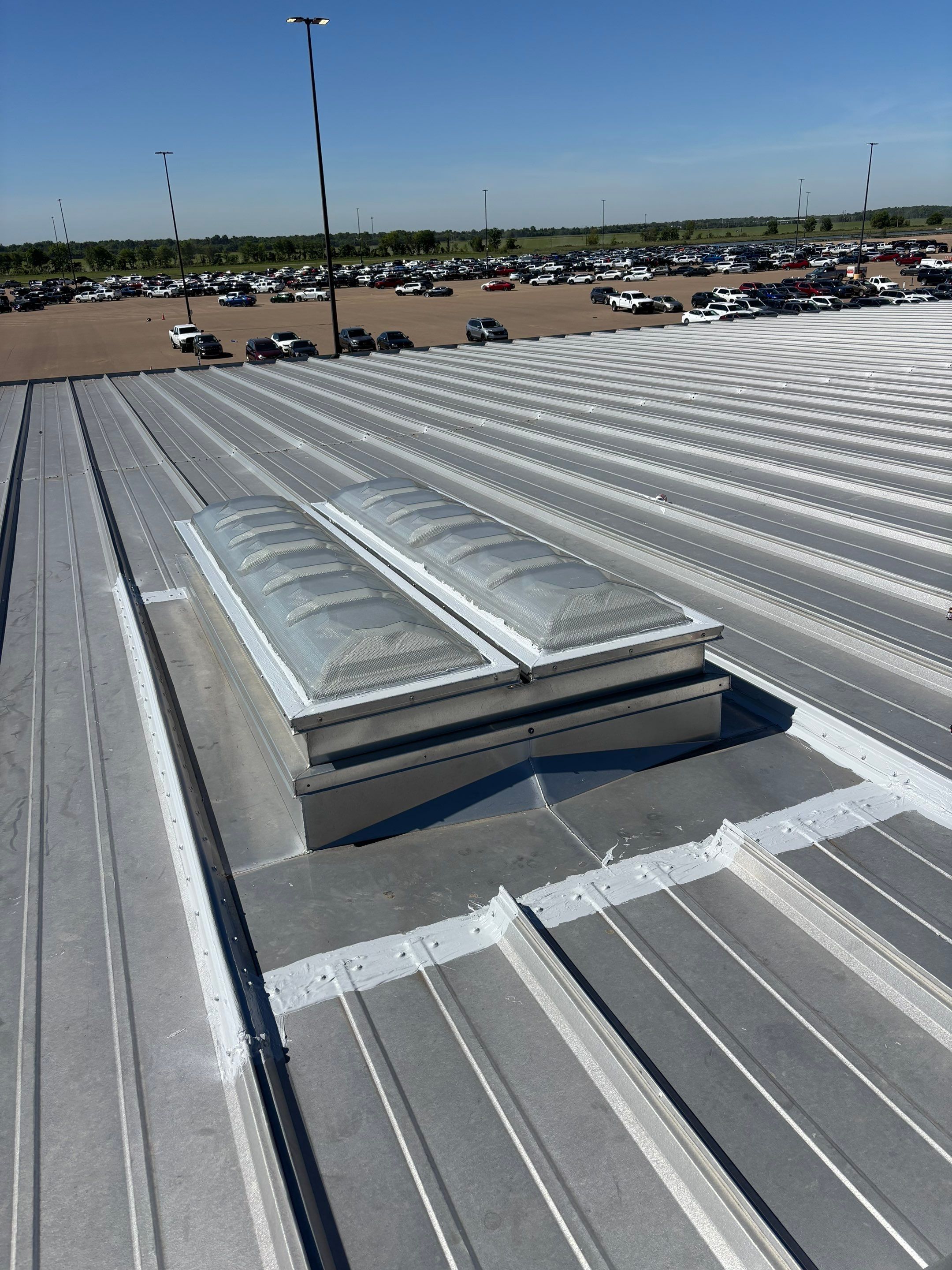 Commercial Metal Roof Repair and Skylight Sealing in West Memphis by Revival Roofing Services
