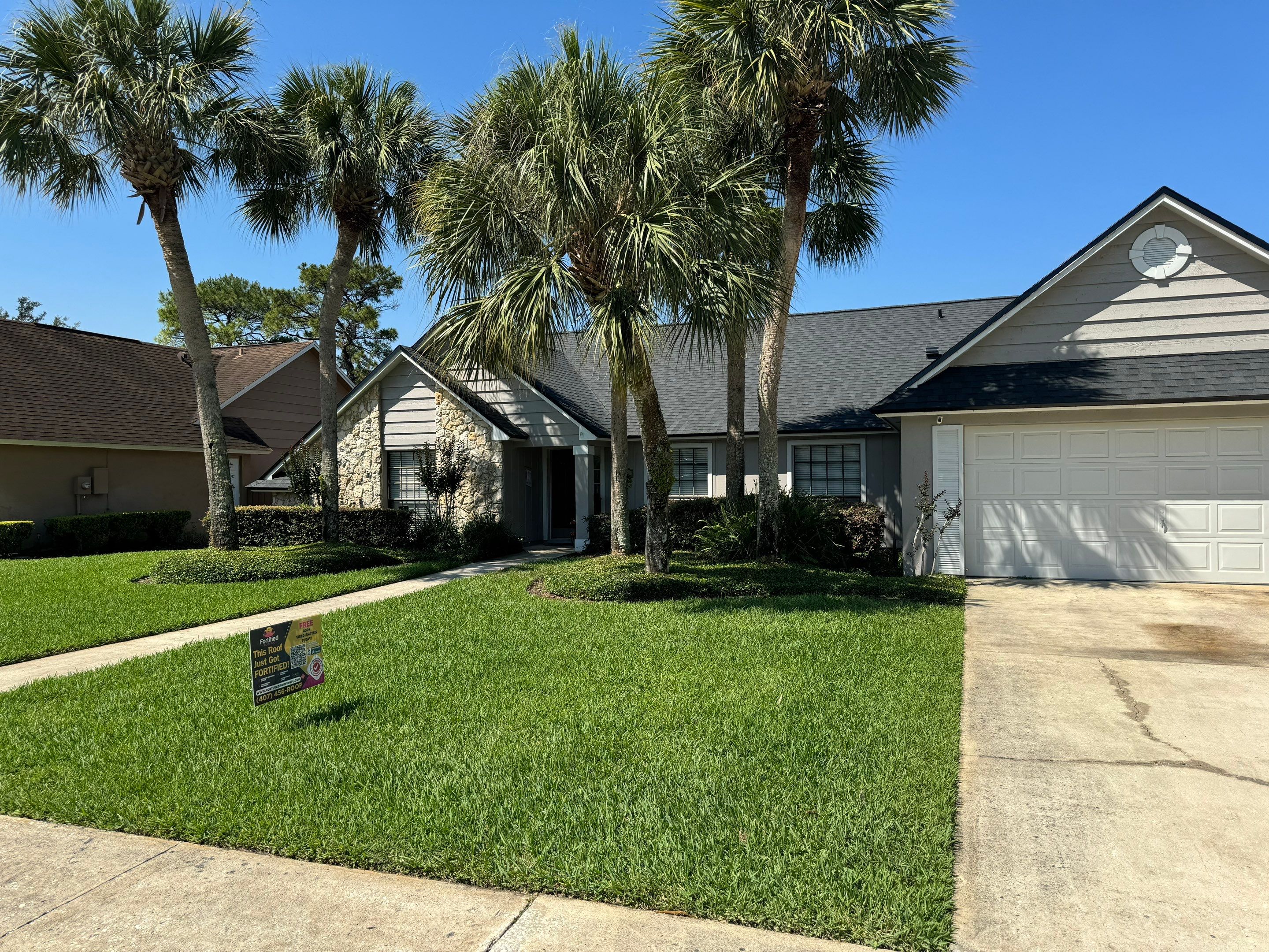 Asphalt Architectural Shingle Roof Replacement and Solar Integration in Longwood by Fortified Roofing Solutions Corp.