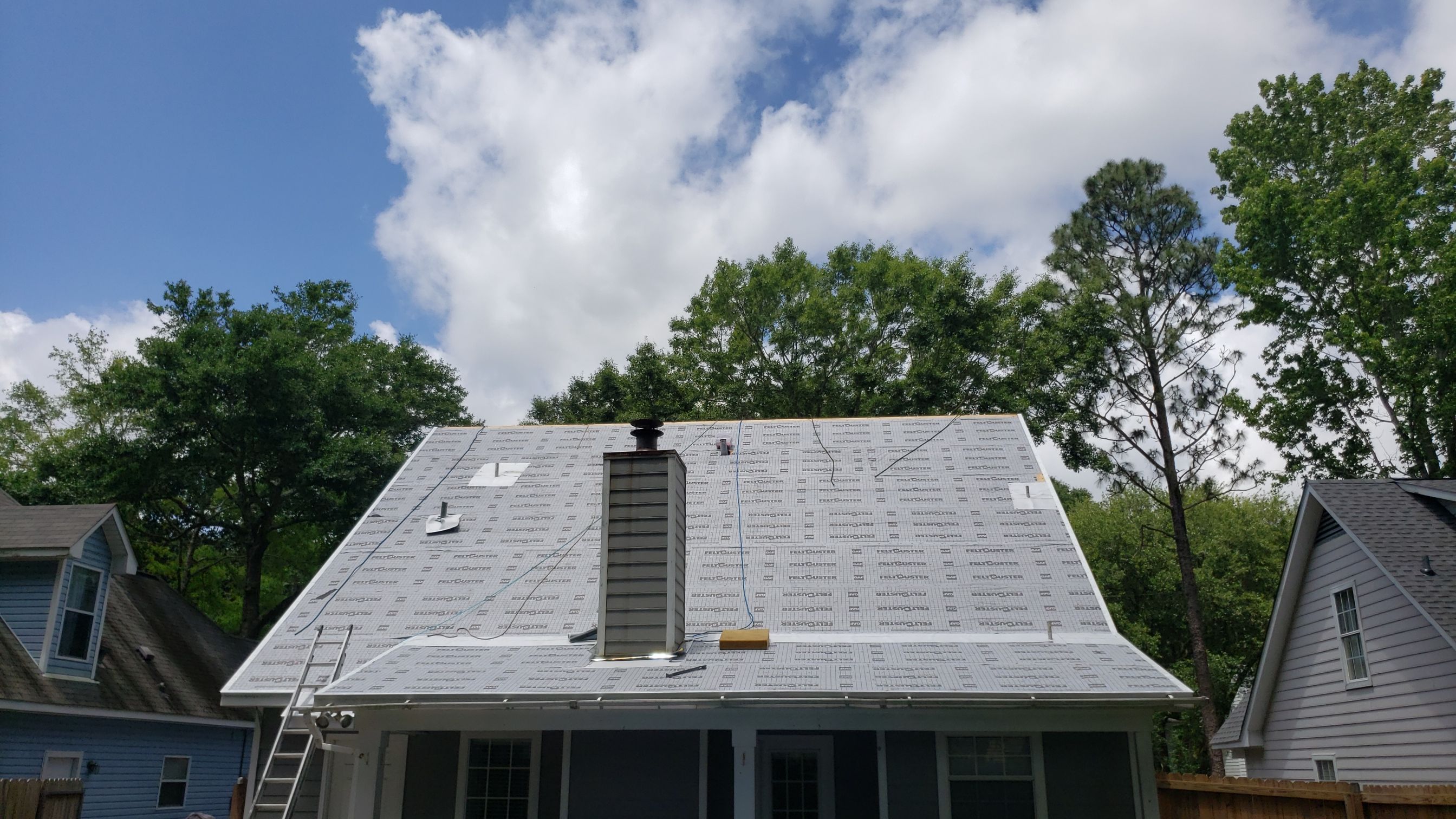 Residential Roofing Installation using Roof Replacement by American Roofing & Construction LLC