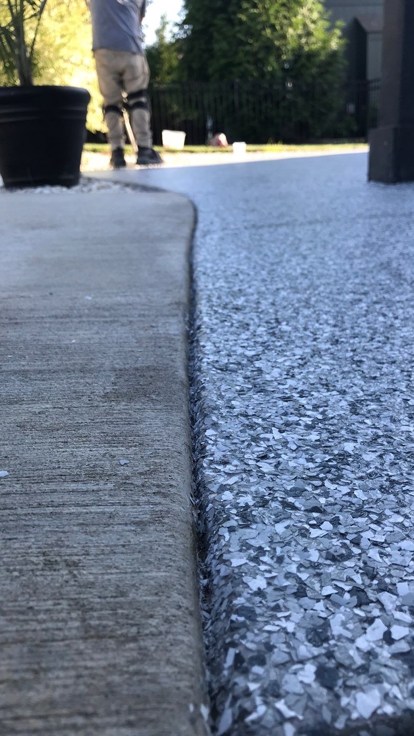 Patio using Slate Stone by Select Painting, Coatings & Garage Cabinets