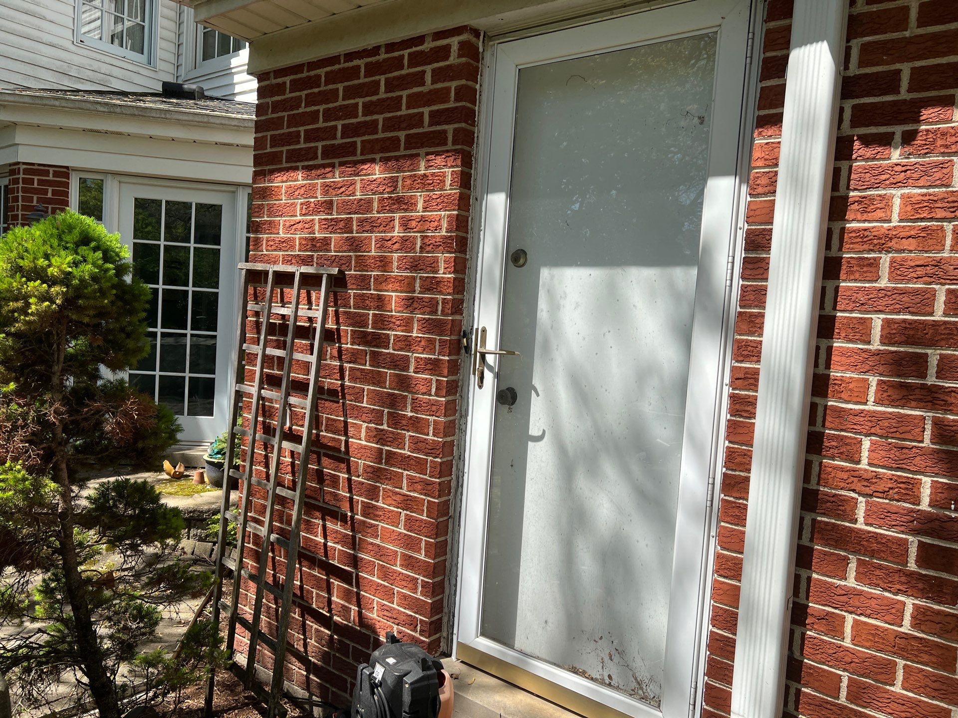 Housewashing  using Algaecide, soft wash soap by Northern Power Washing LLC.