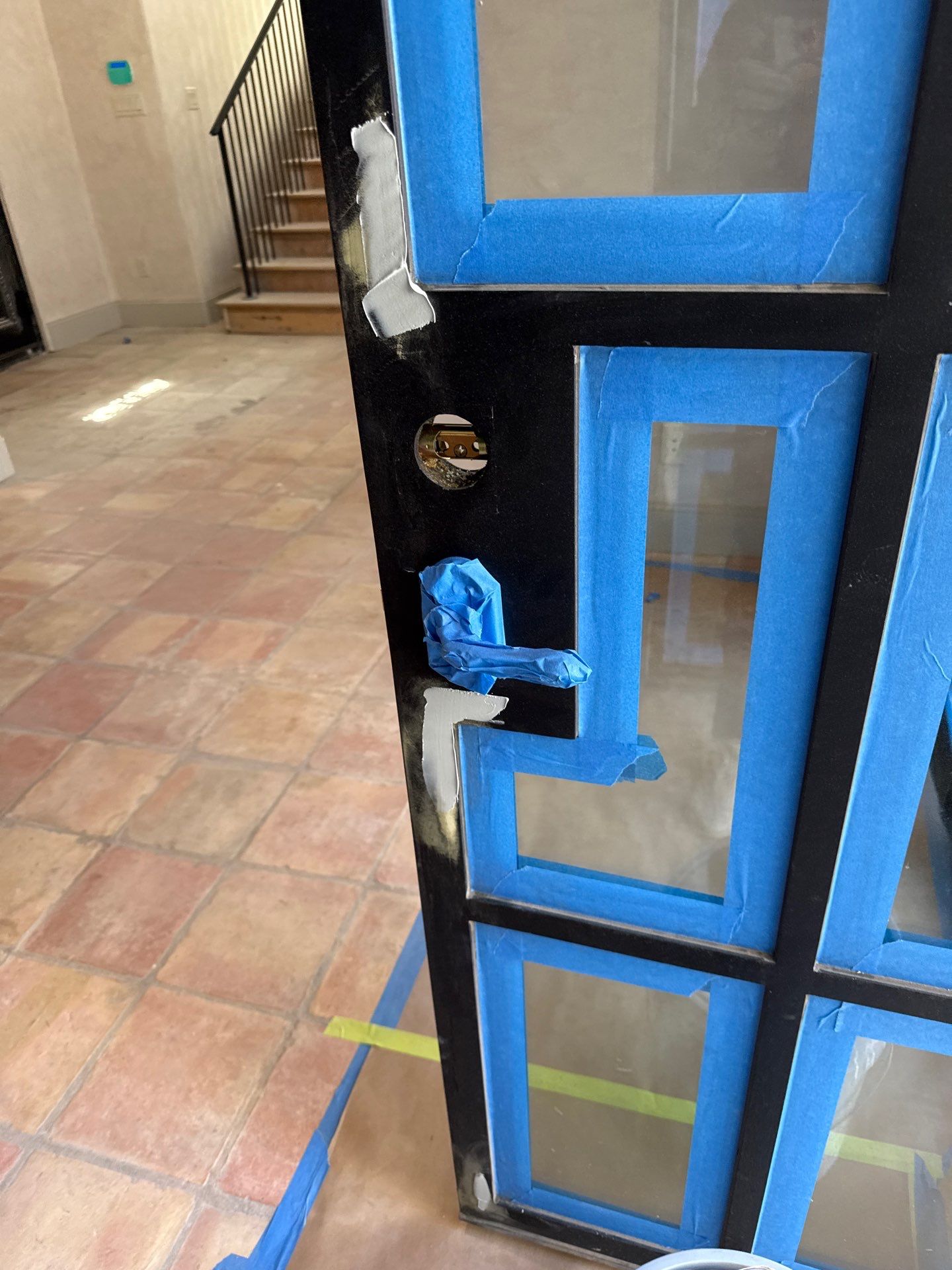 Arched Black Metal French Door Installation and Finishing in Fort Worth by Solara Custom Living