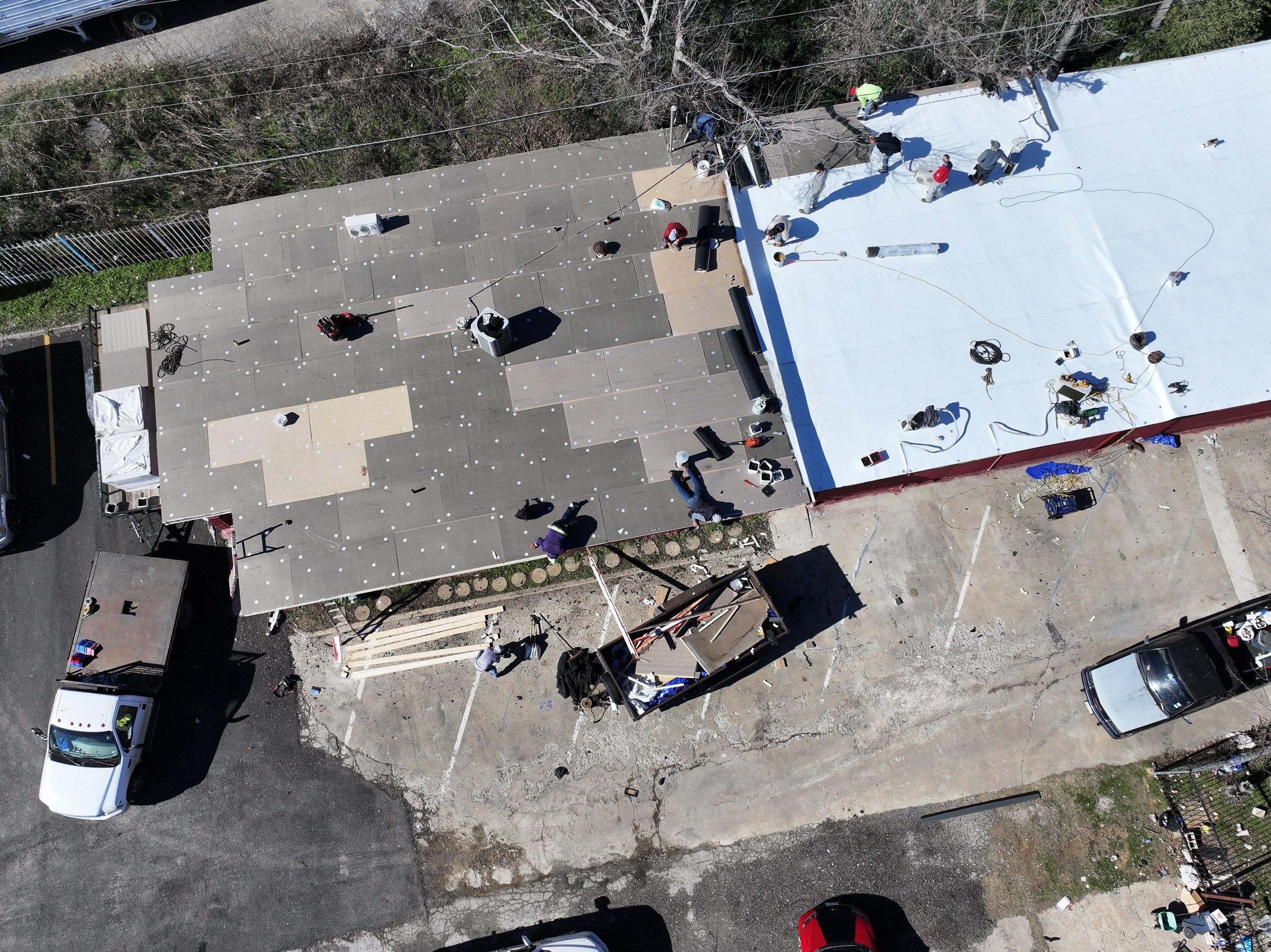Commercial roofing overlay using GAF TPO over an old ballast roof by Becker Roofing and Exteriors
