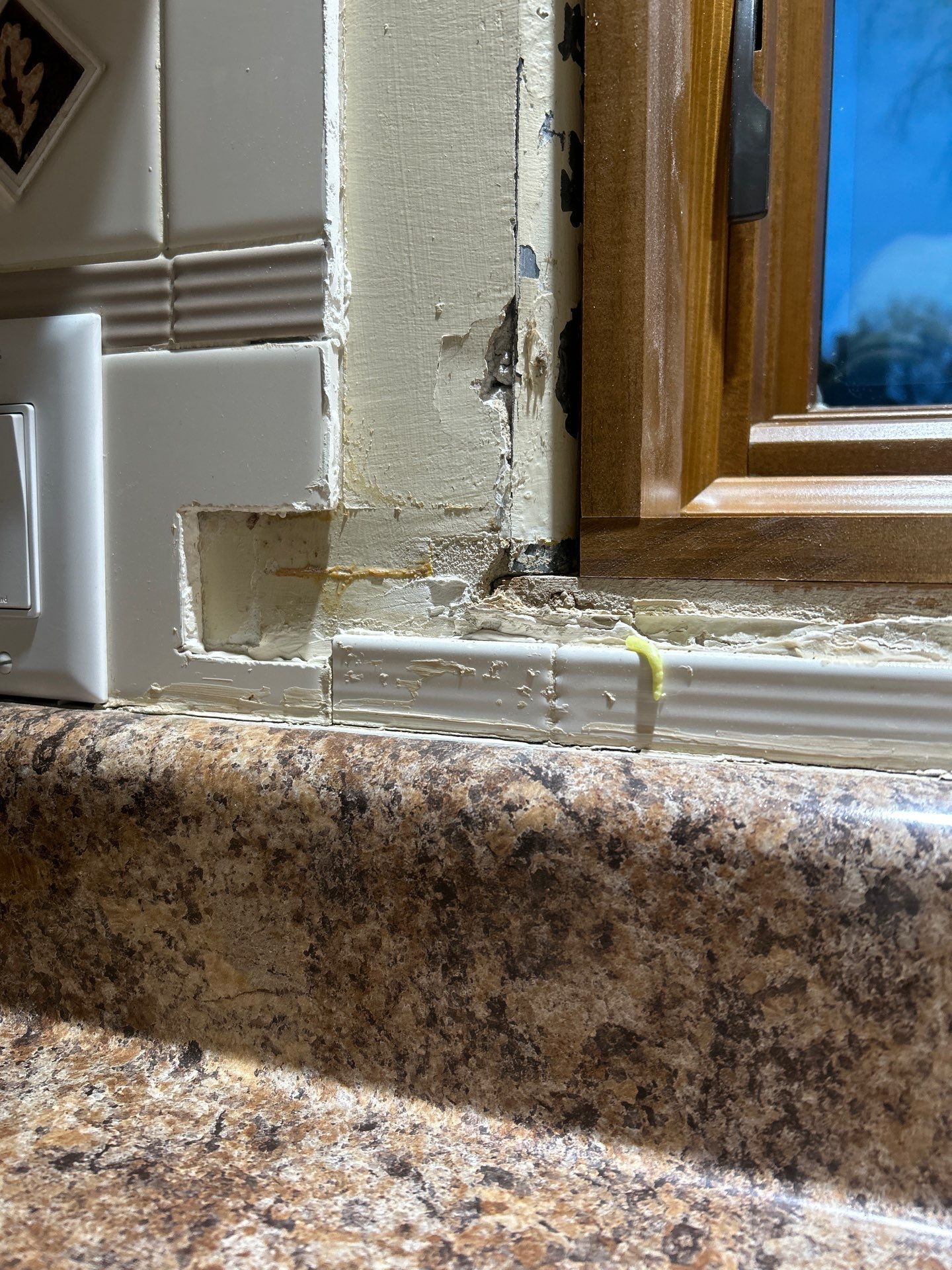 Black-Frame Pella Lifestyle Upgrade on a Partial Brick Home by United Windows and Siding LLC