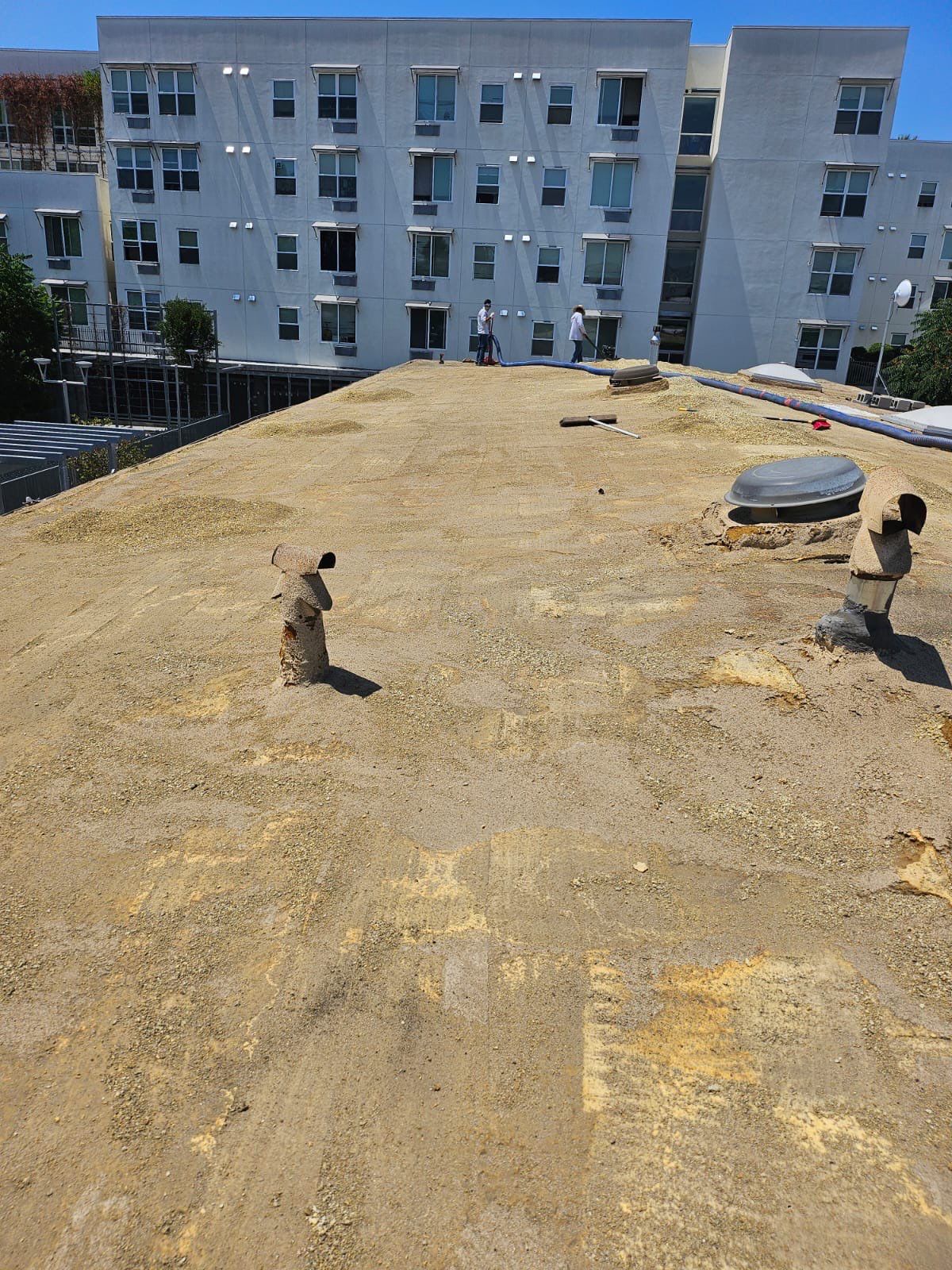 Foam Refurbish using Conklin Benchmark/PUMA XL coatings and spray foam by Straight Edge Roofing Inc