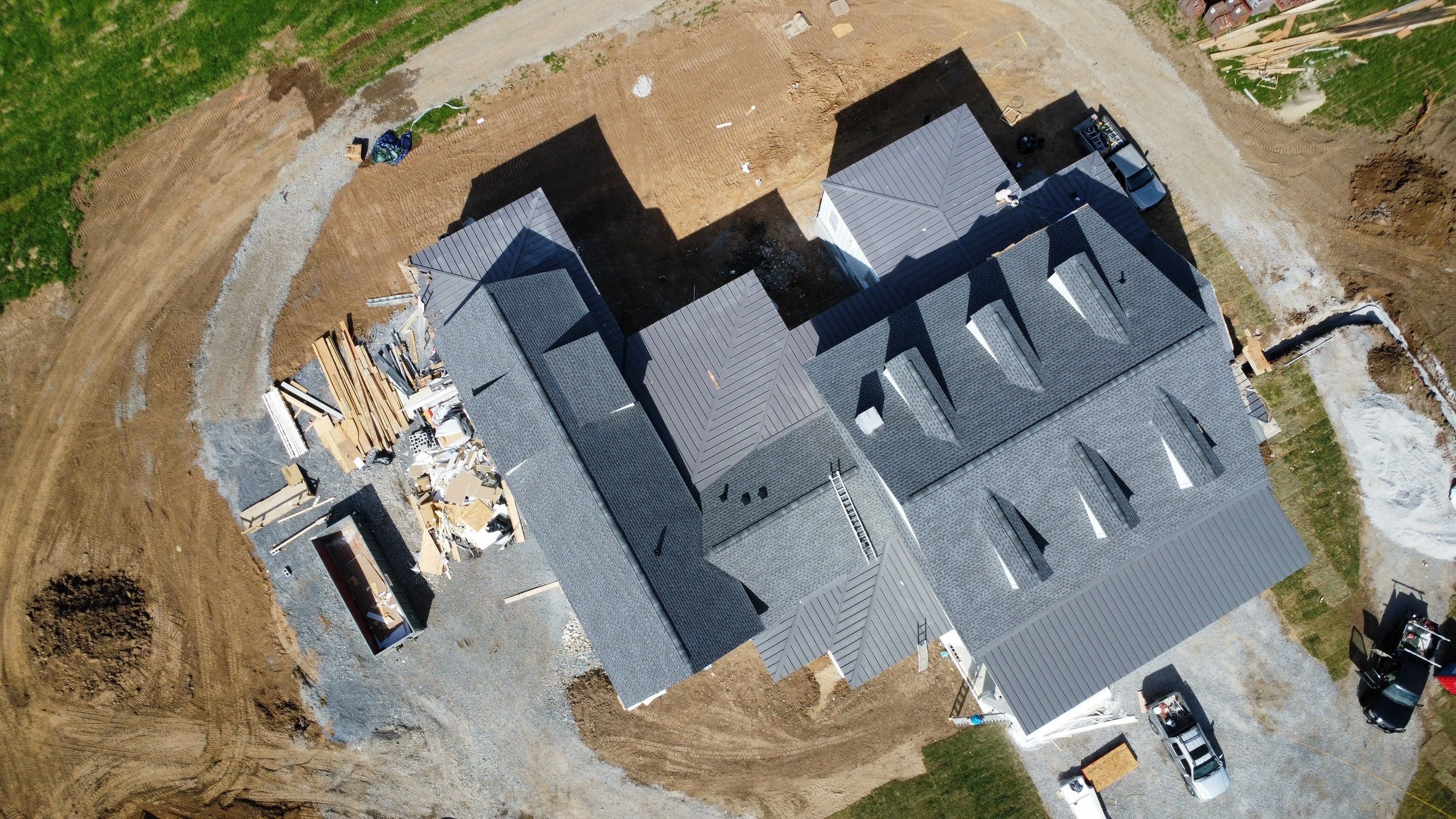 Residential Roof Install - Shingles and Standing Seam Metal by Undersun Roofing 