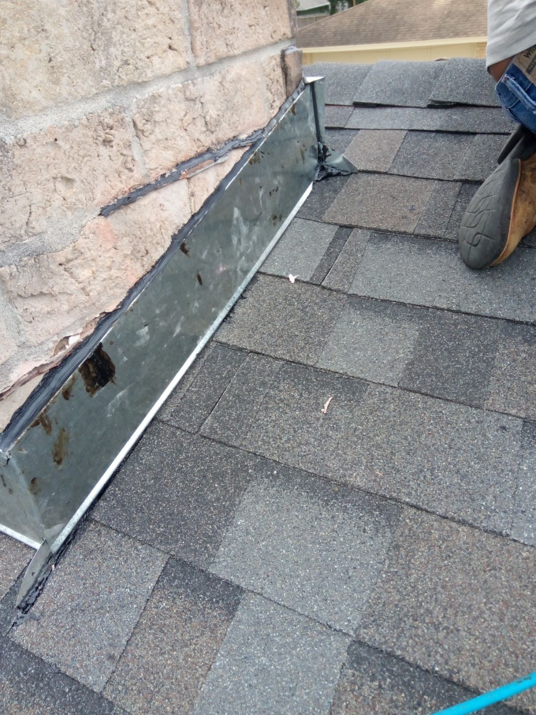 Colored Vinyl Windows to blend into brick by Bayfront Roofing and Construction