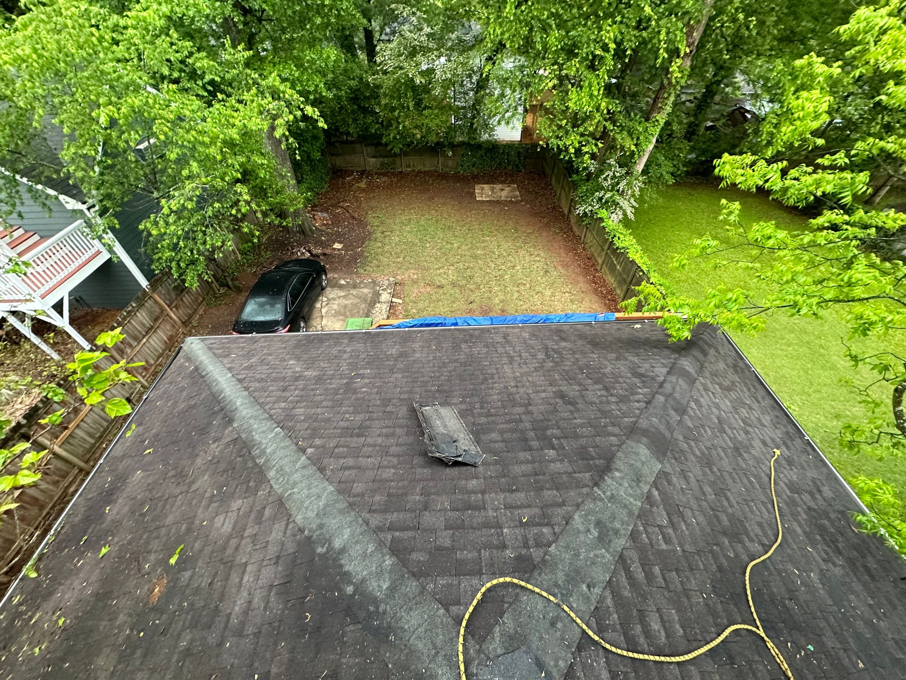 roof replacement and new black gutters by Nailed It Roofing & Remodeling LLC