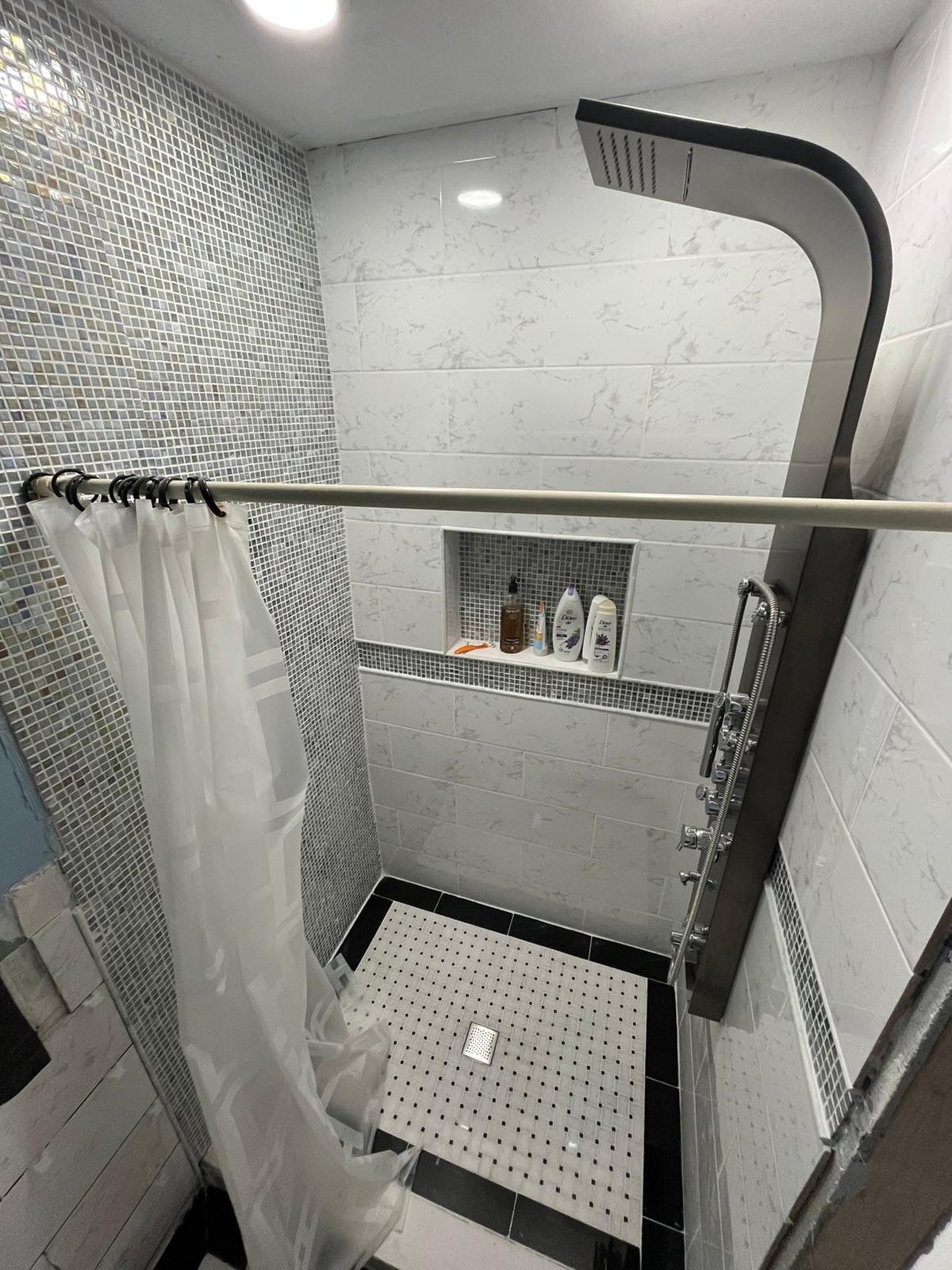 Bathroom Remodel using Tile by Home Concepts Construction
